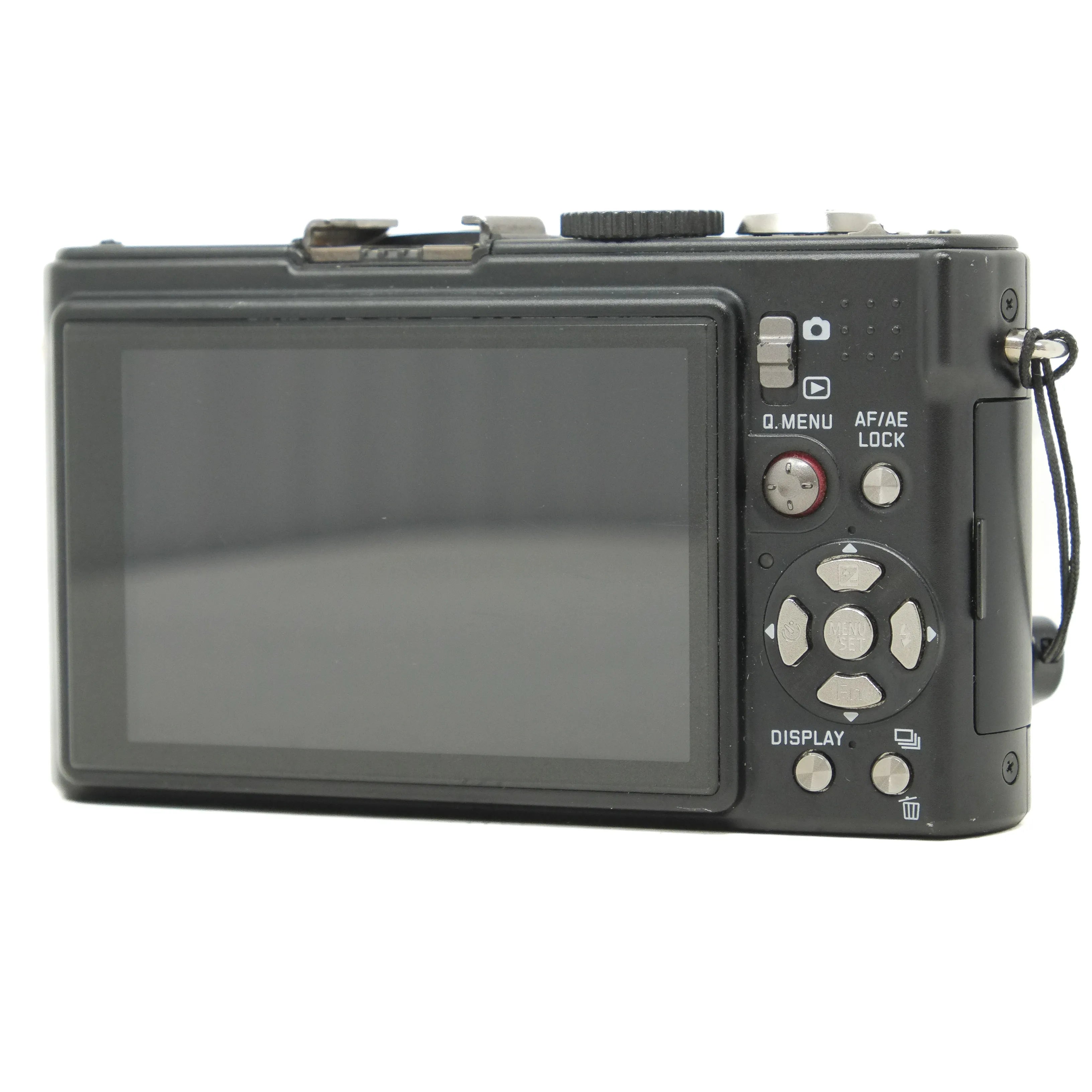 Black digital camera with screen and control buttons on a white background