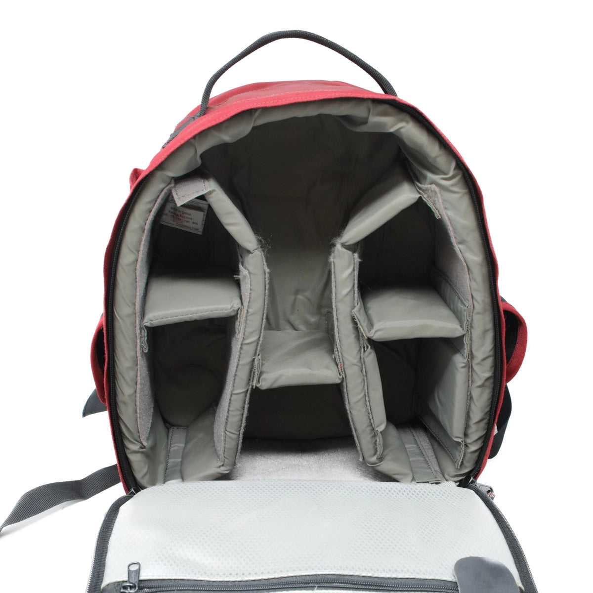 Backpack with gray interior compartments on a white background