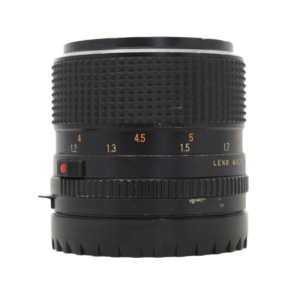 Black camera lens with focus and f-number markings on a white background