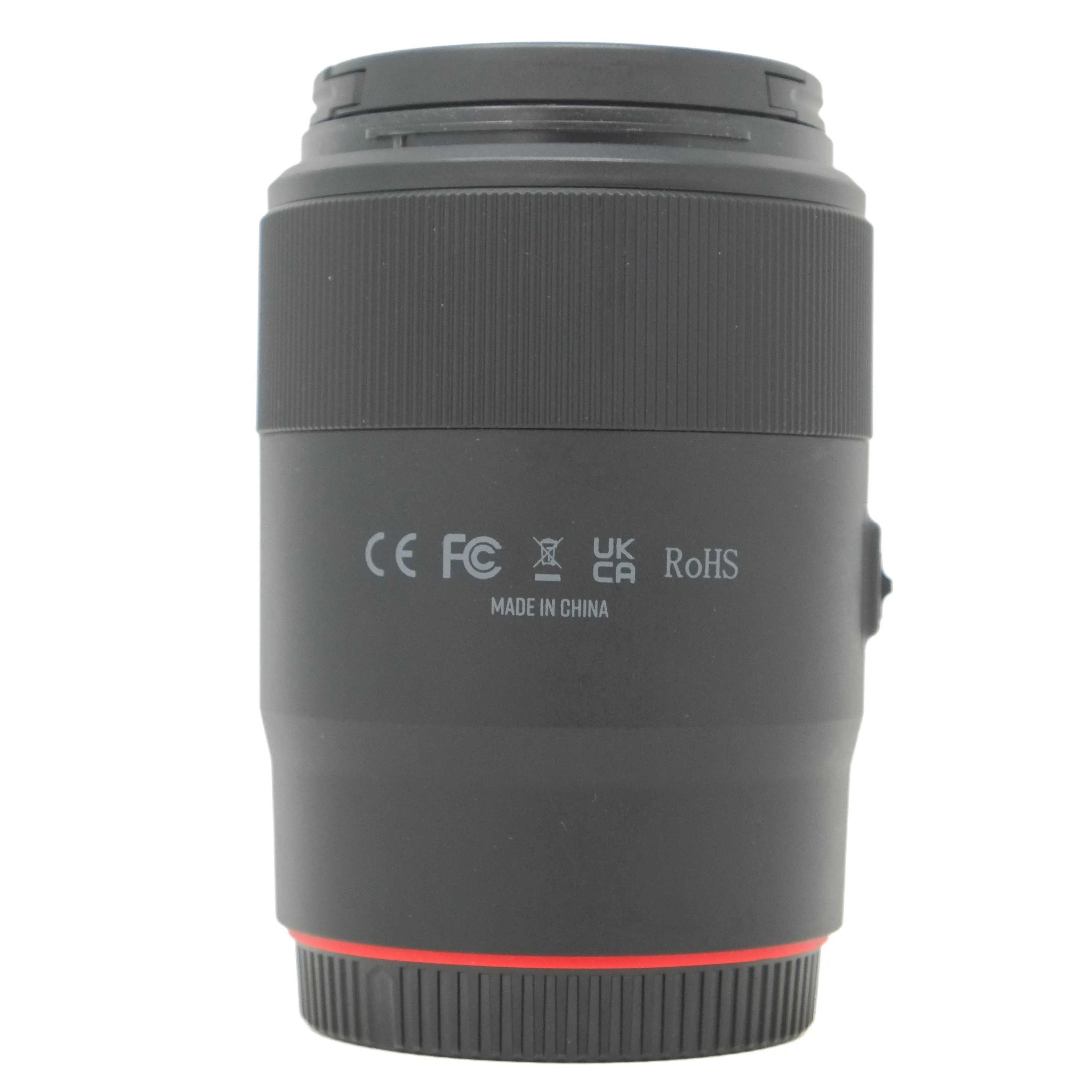 Camera lens with certification logos on a white background