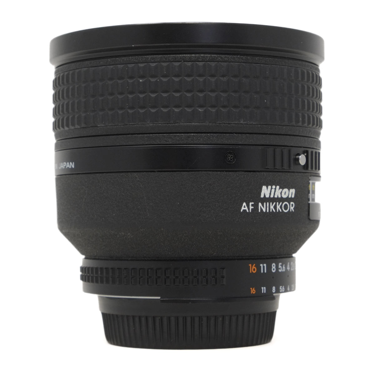 Nikon AF Nikkor camera lens on a white background