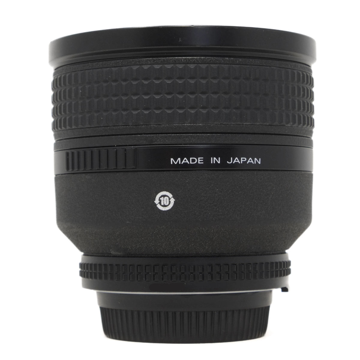 Black camera lens with 'Made in Japan' text on a white background