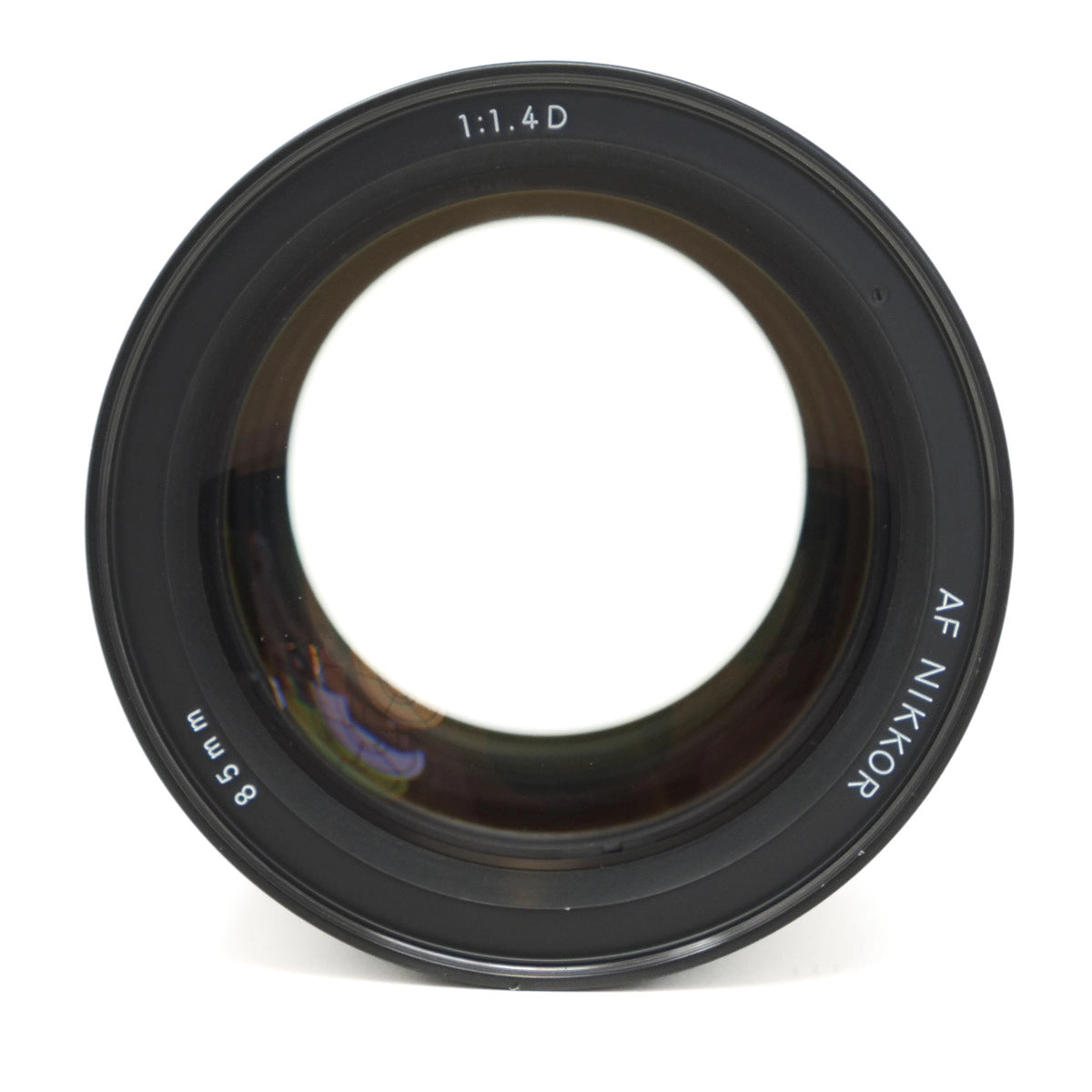 Camera lens with 'AF Nikon' branding on a white background