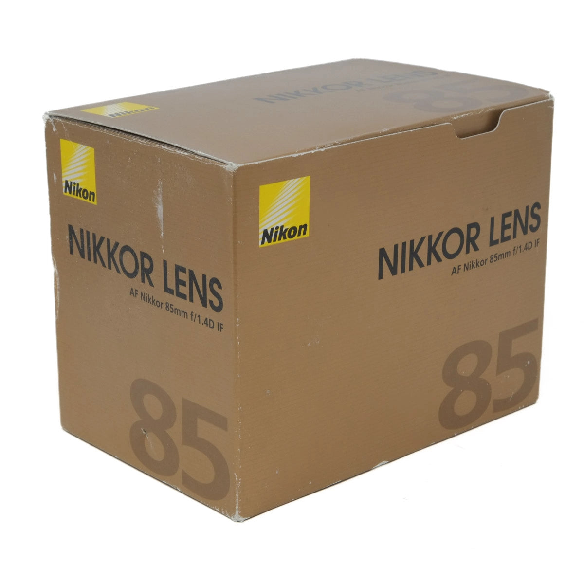 Cardboard box with Nikon Nikkor lens branding on a white background