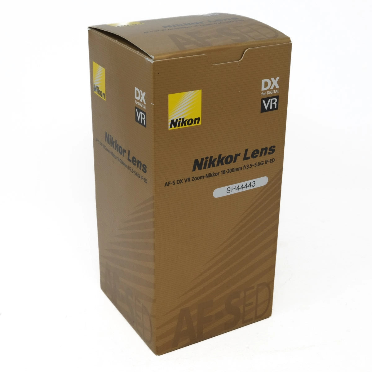 Nikon Nikkor lens packaging box on a white background
