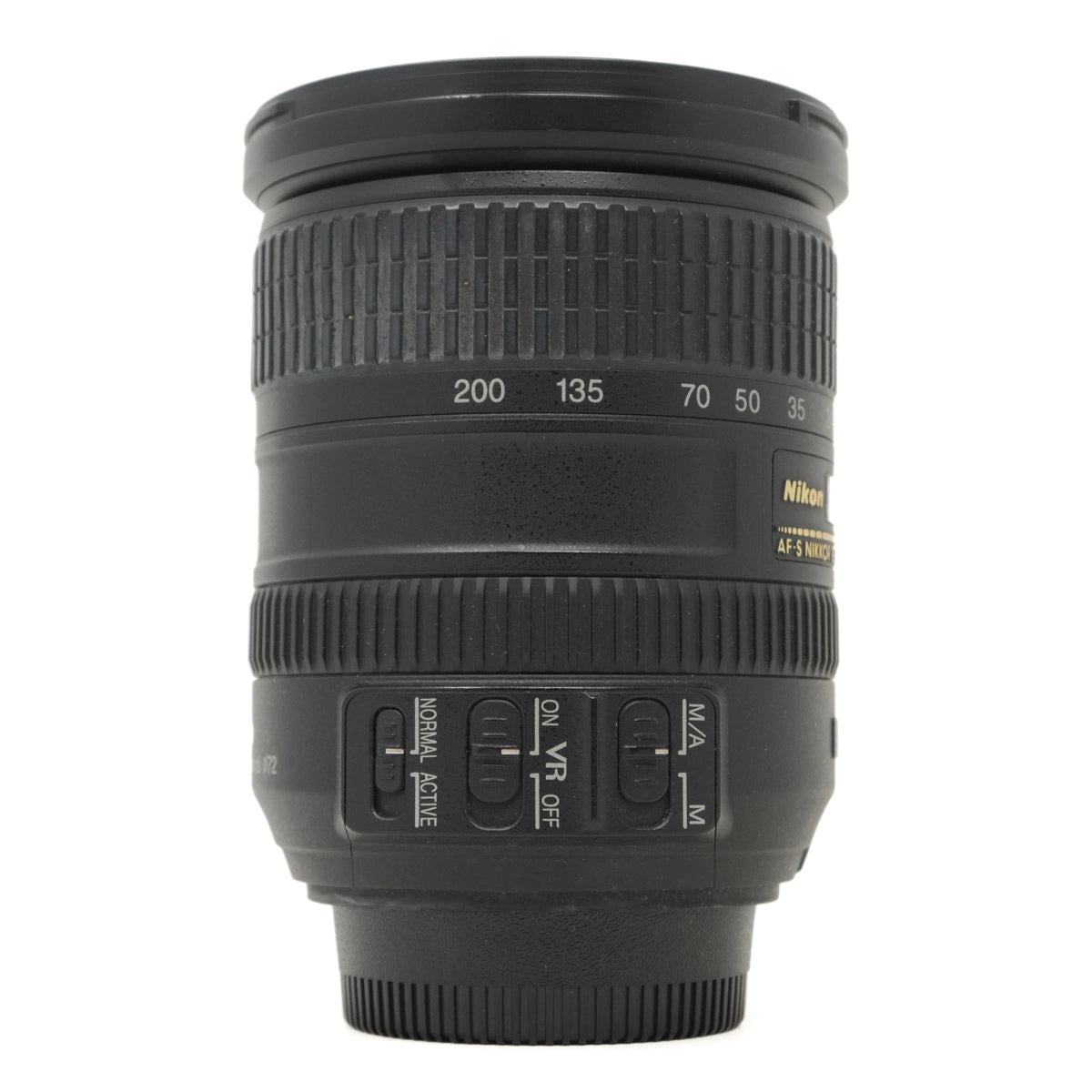 Camera lens with Nikon branding on a white background