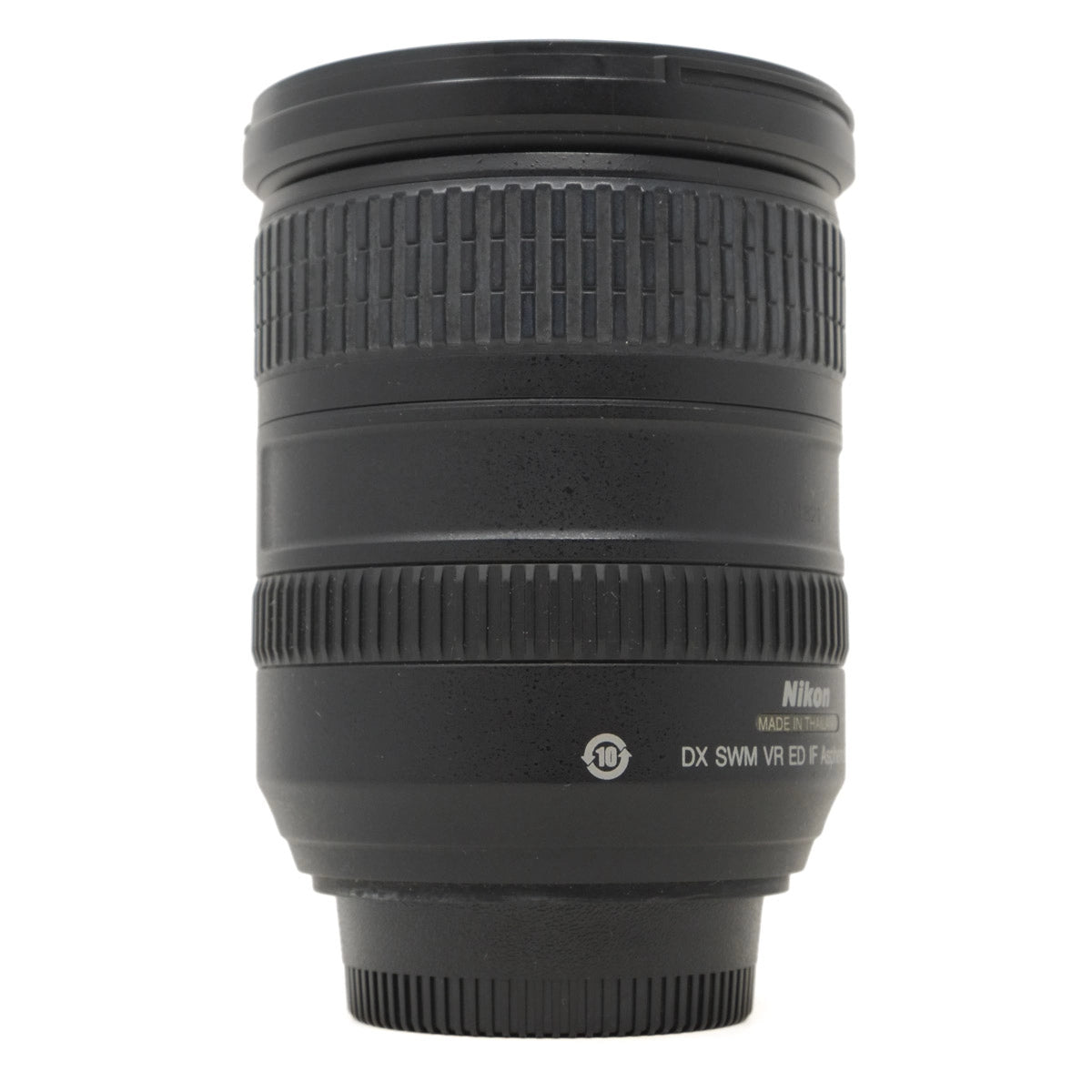 Black Nikon camera lens on a white background
