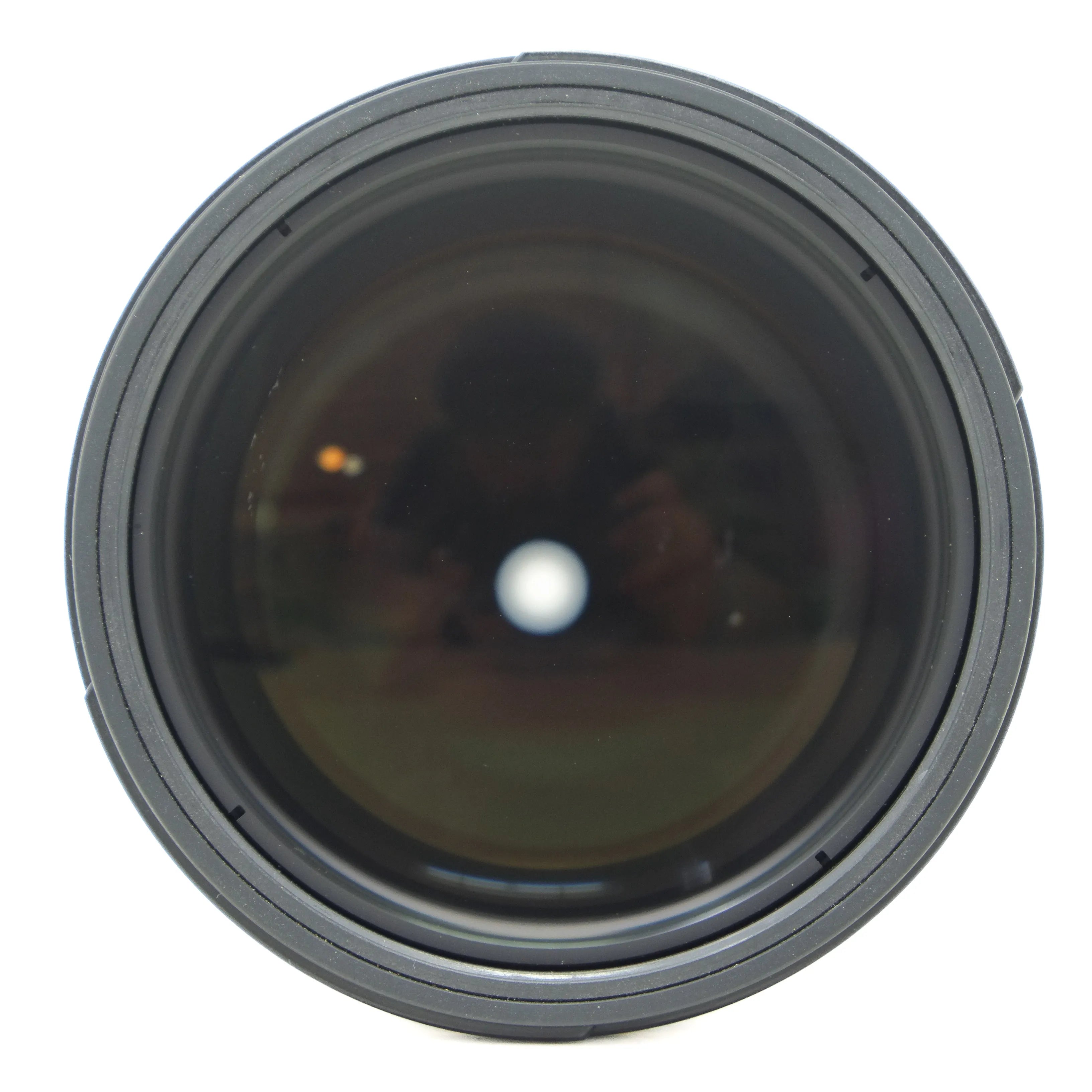Close-up of a camera lens on a white background