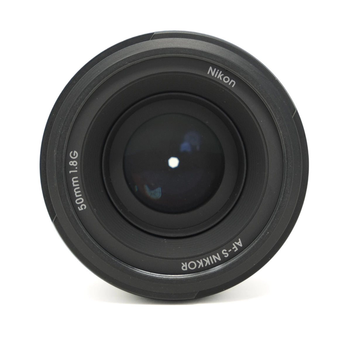 Nikon camera lens on a white background