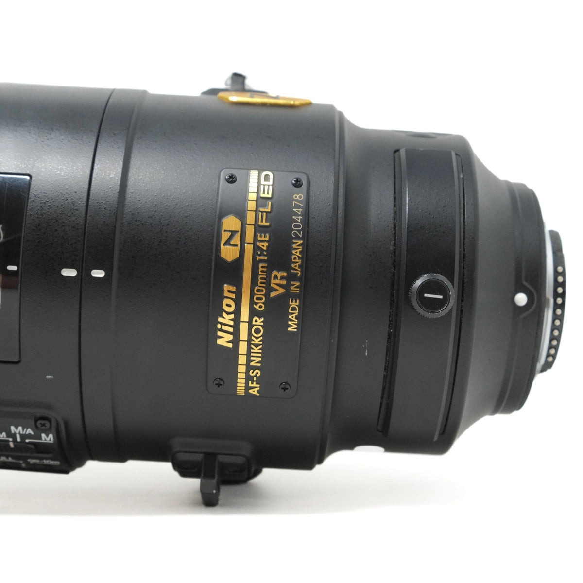 Nikon camera lens on a white background