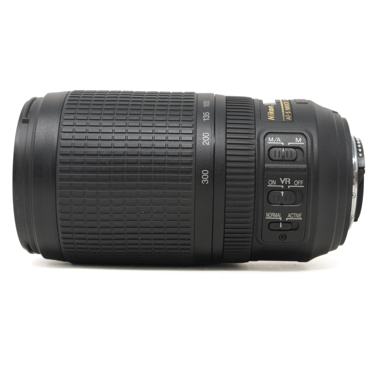 Camera lens with control buttons on a white background