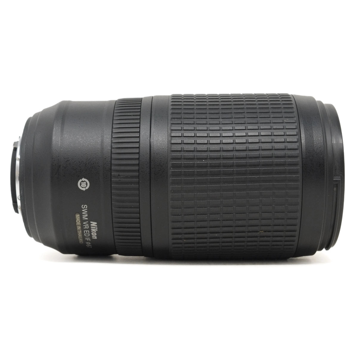 Black camera lens with Nikon branding on a white background