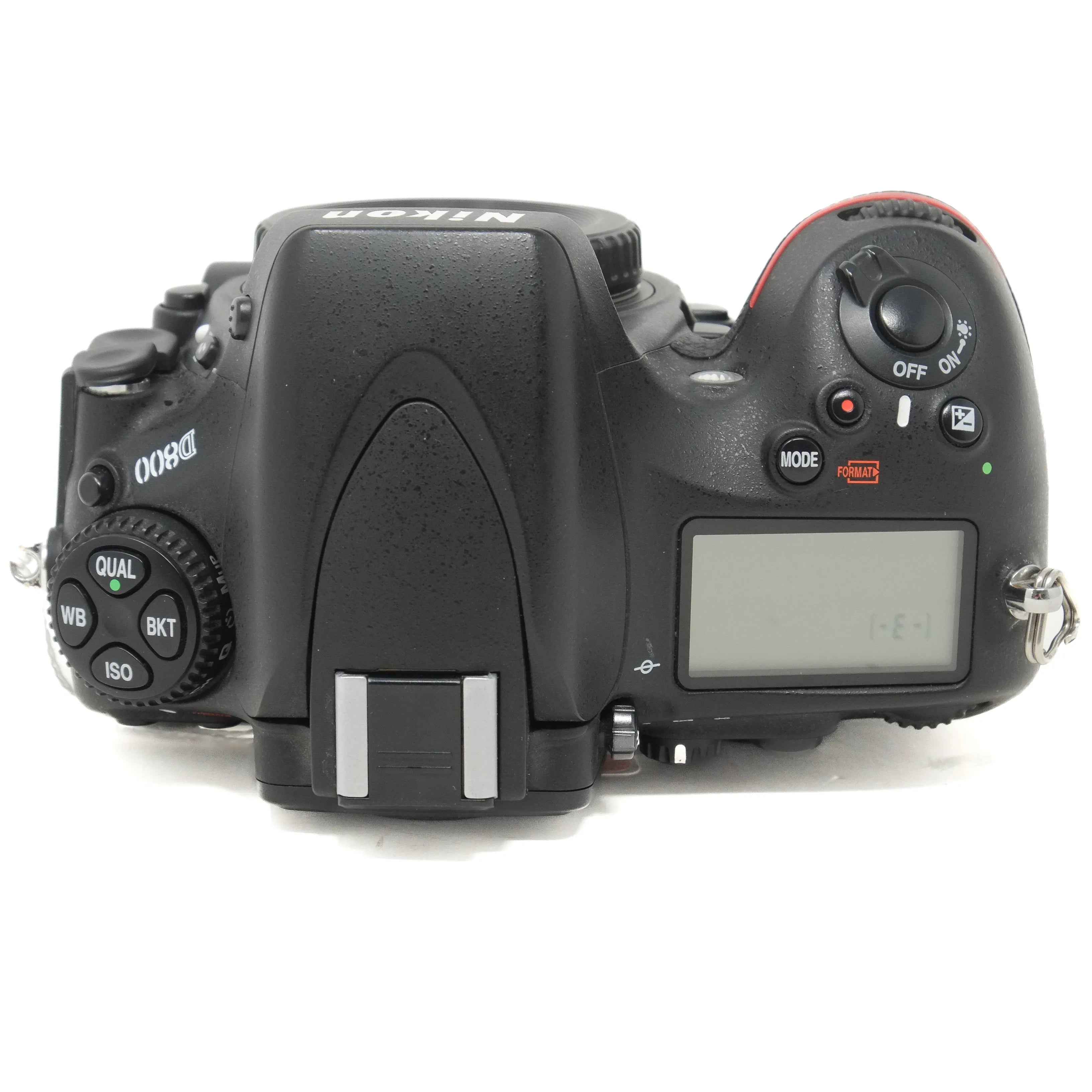 Black Nikon DSLR camera on a white background