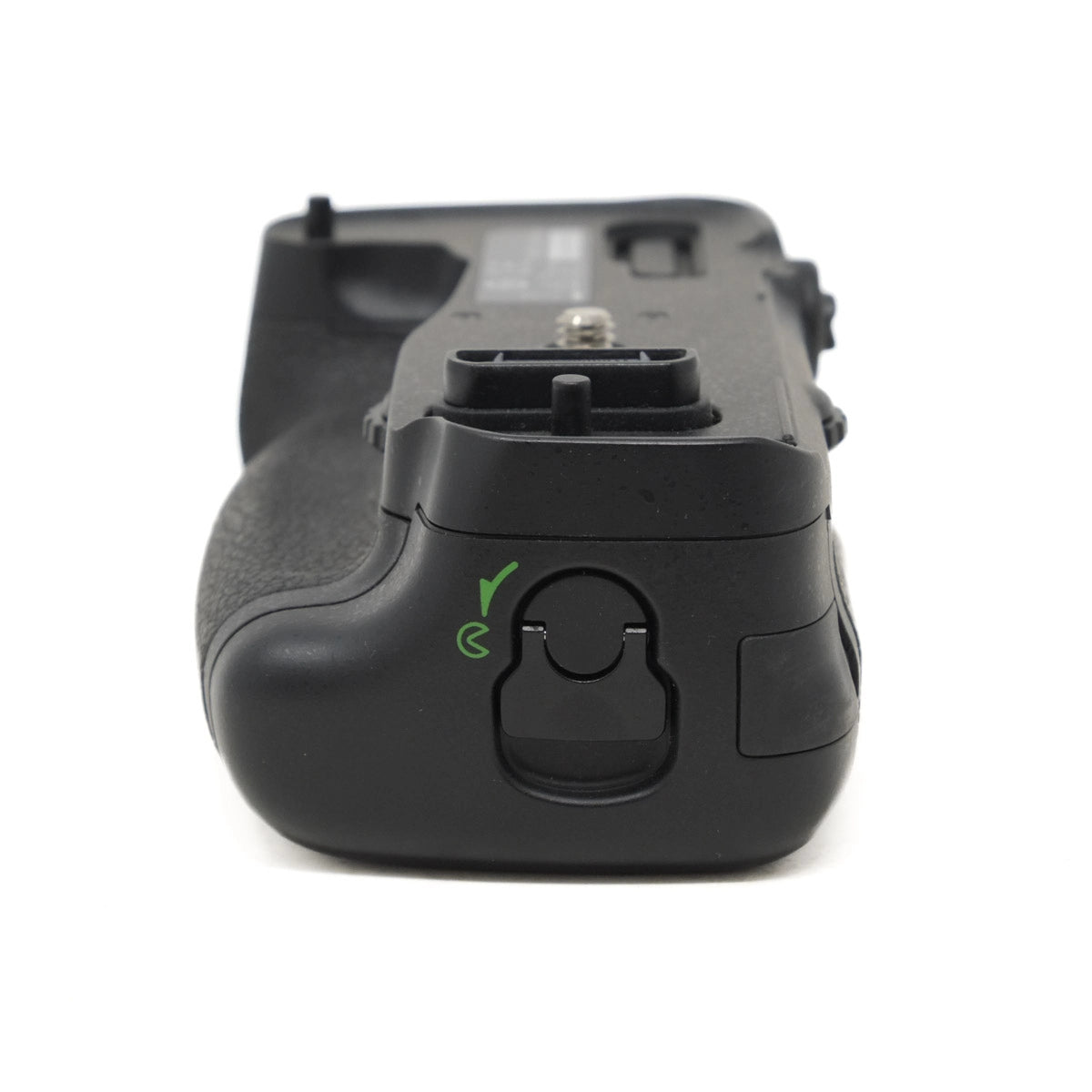 Black camera battery grip on a white background