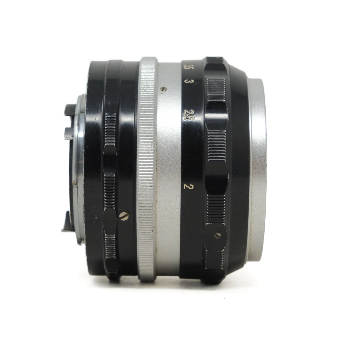 Camera lens with black and silver design on a white background