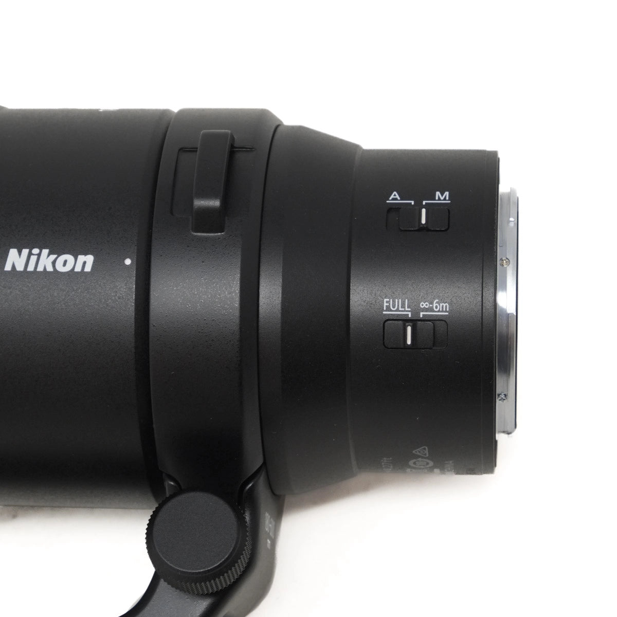 Nikon camera lens on a white background