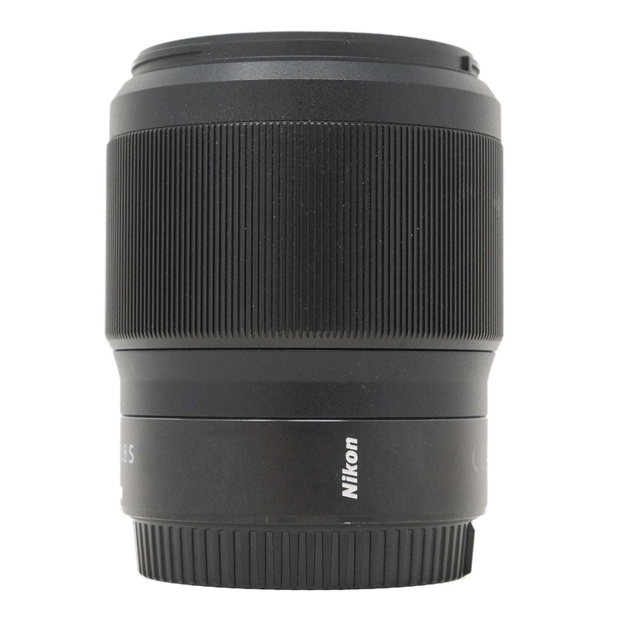 Black Nikon camera lens on a white background
