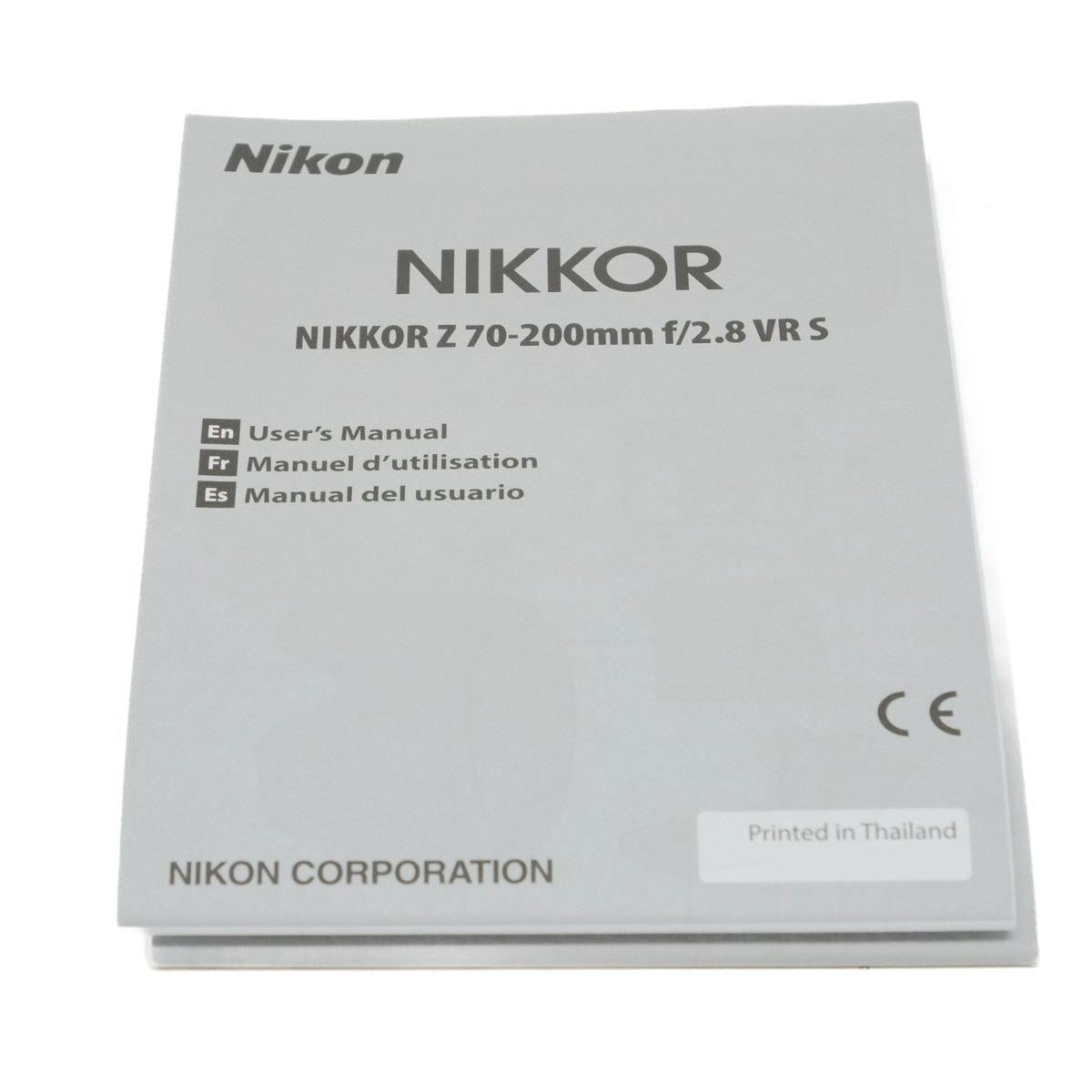 Nikon Nikkor camera lens user manual on a white background