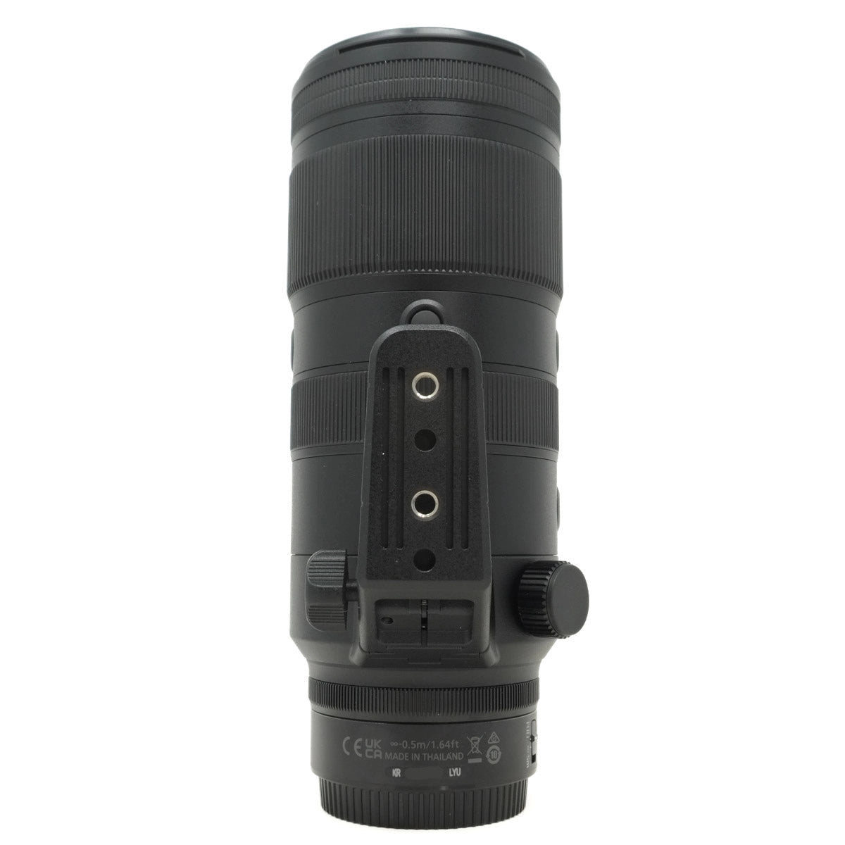 Black camera lens on a white background
