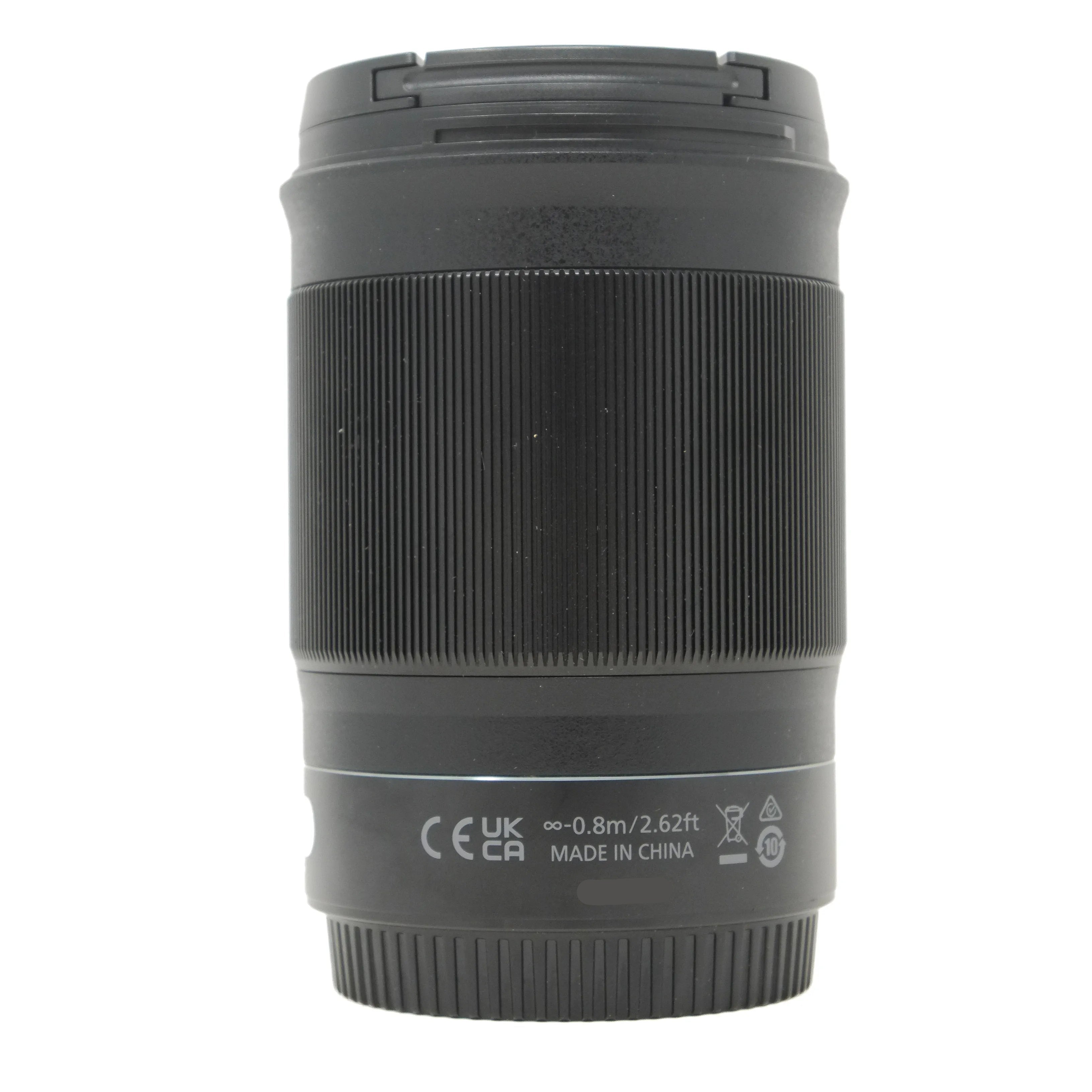 Black camera lens on a white background