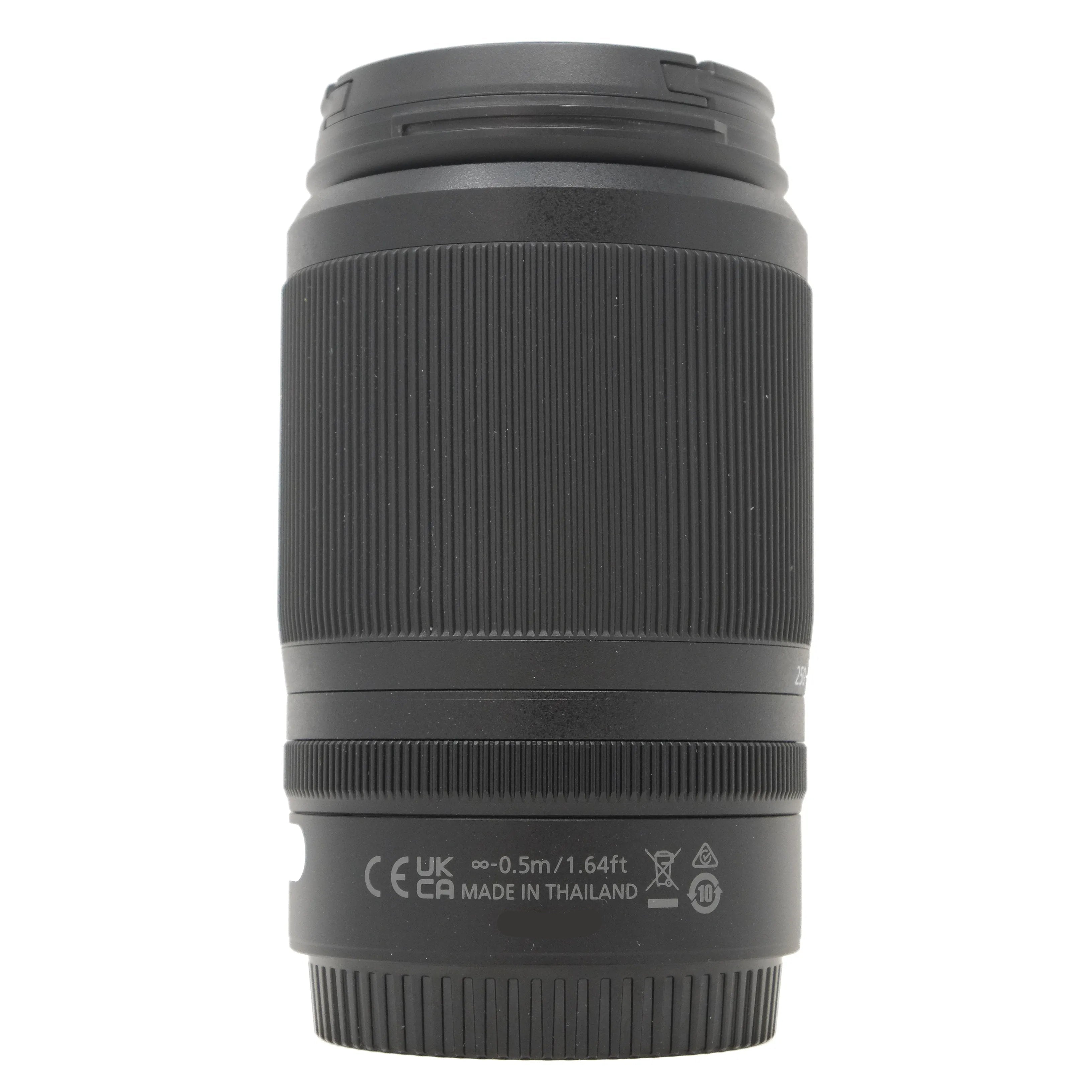 Black camera lens on a white background