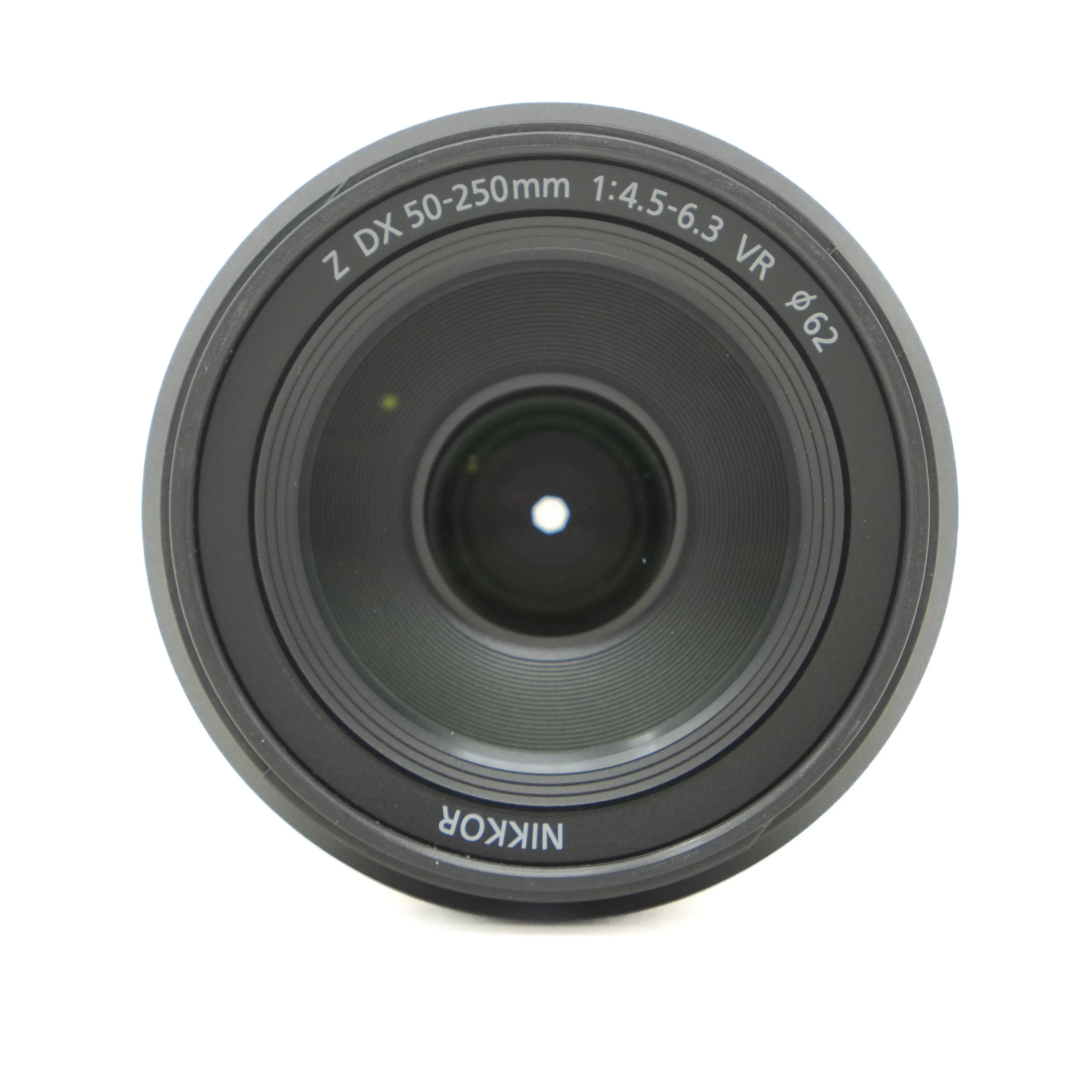 Camera lens with Nikkor branding on a white background