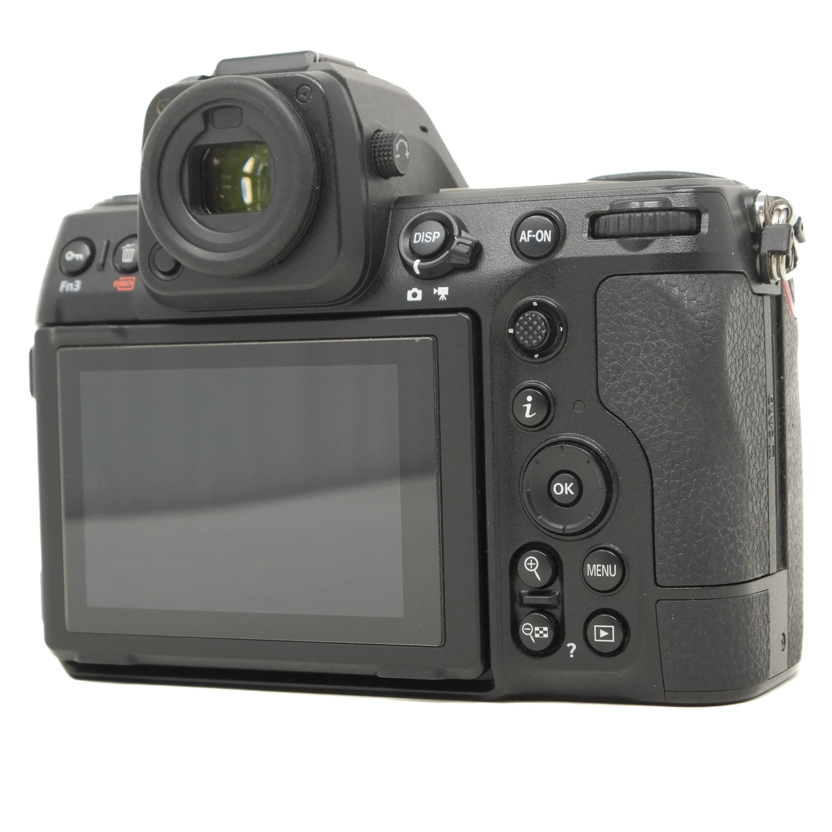 Back view of a black camera with control buttons on a white background