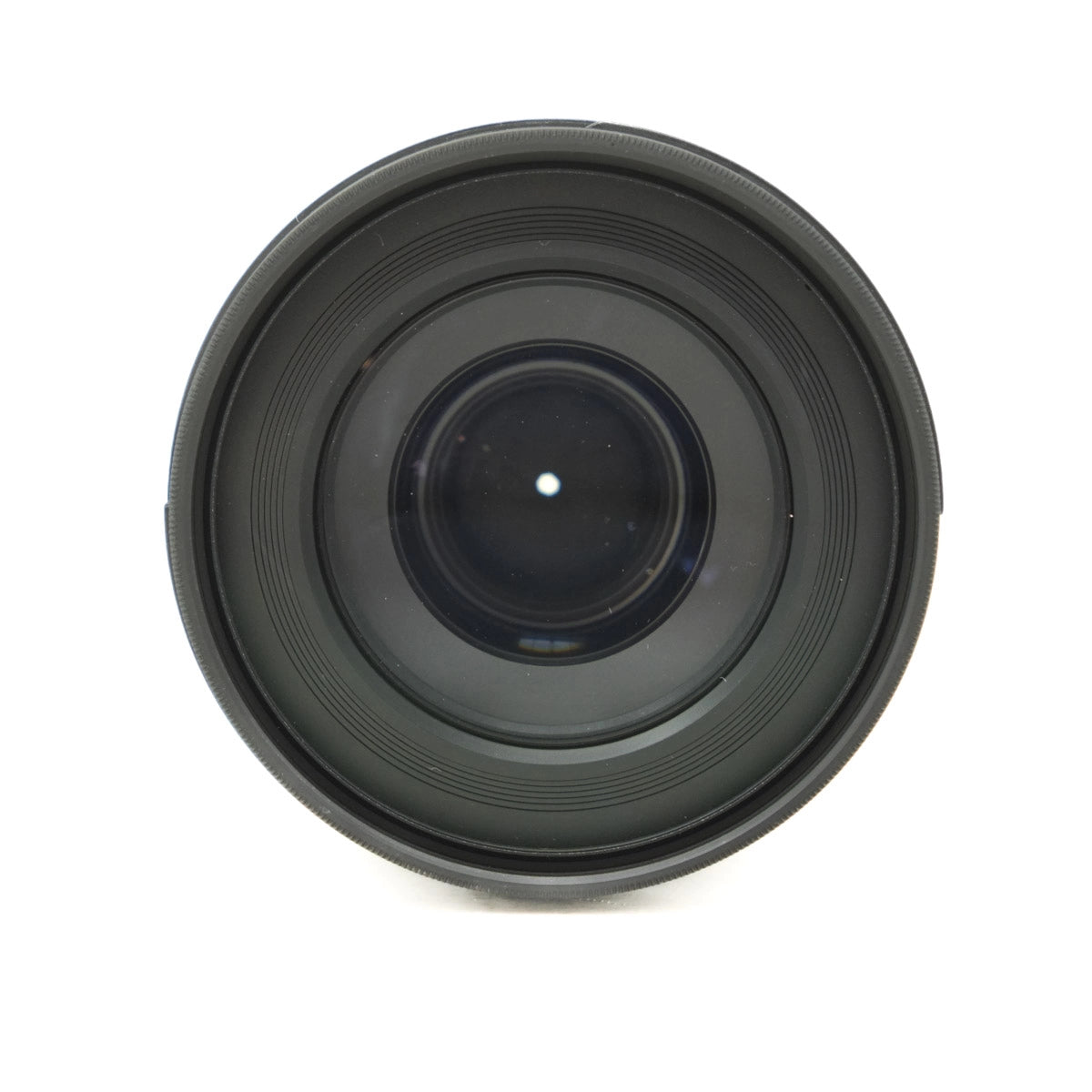 Black camera lens on a white background