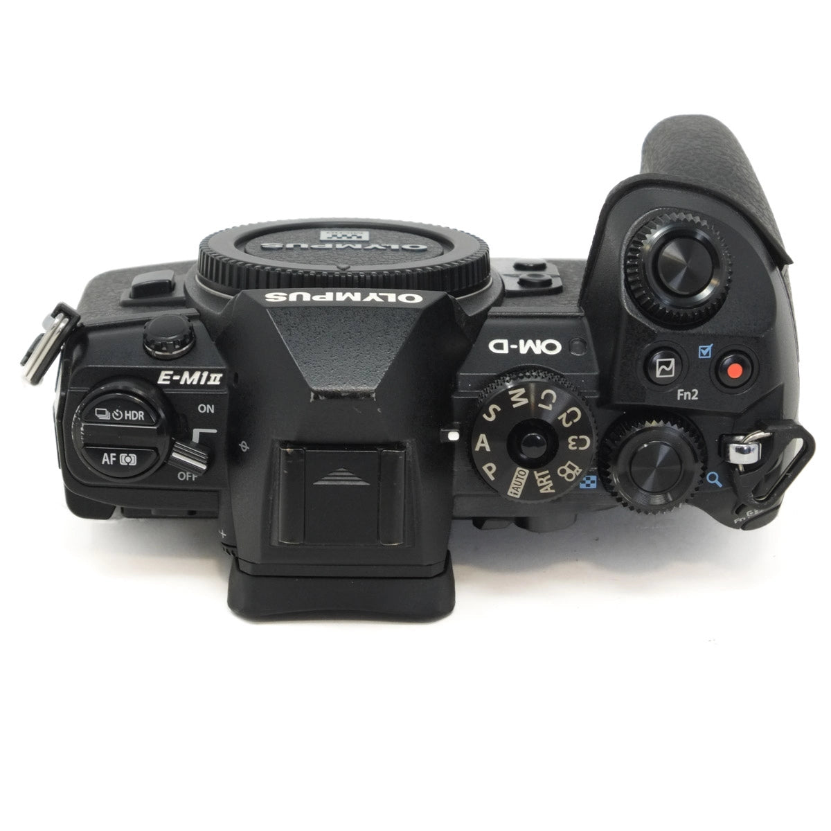 Top view of a Olympus camera on a white background