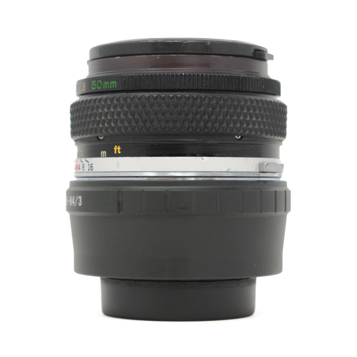 Camera lens with focus and aperture information on a white background