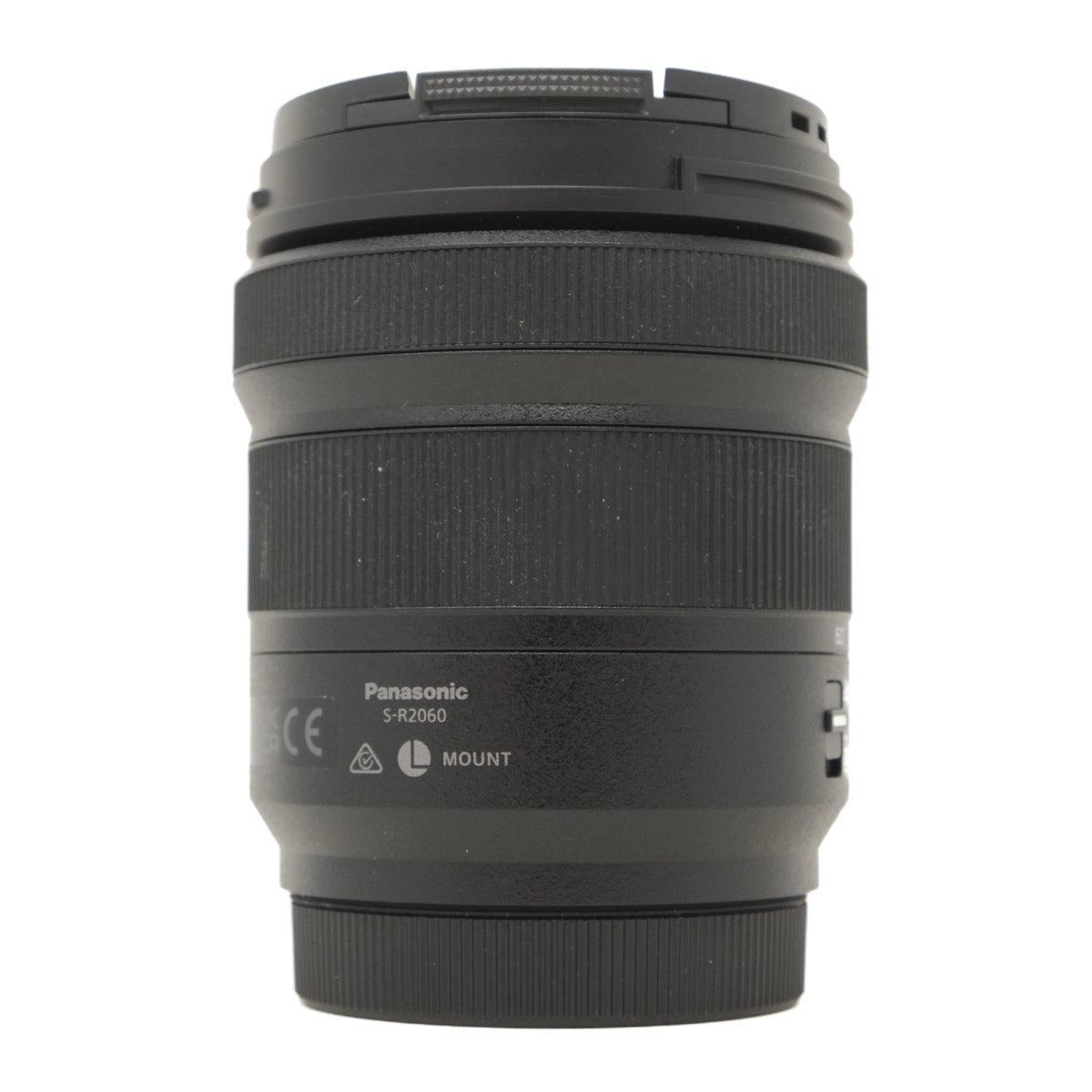Black camera lens with Panasonic branding on a white background