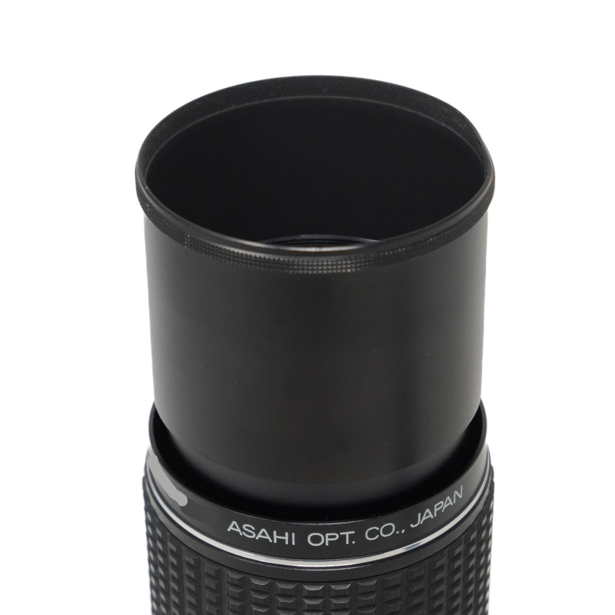 Black telescope lens with 'Asahi Opt. Co., Japan' branding on a white background
