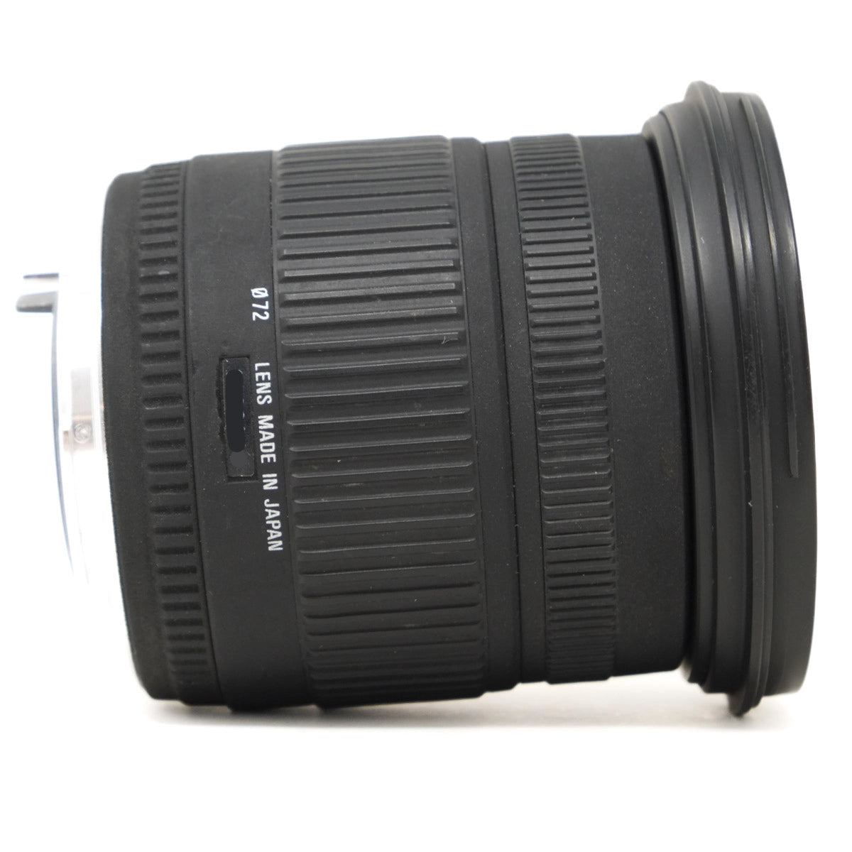 Camera lens with 'Made in Japan' text on a white background