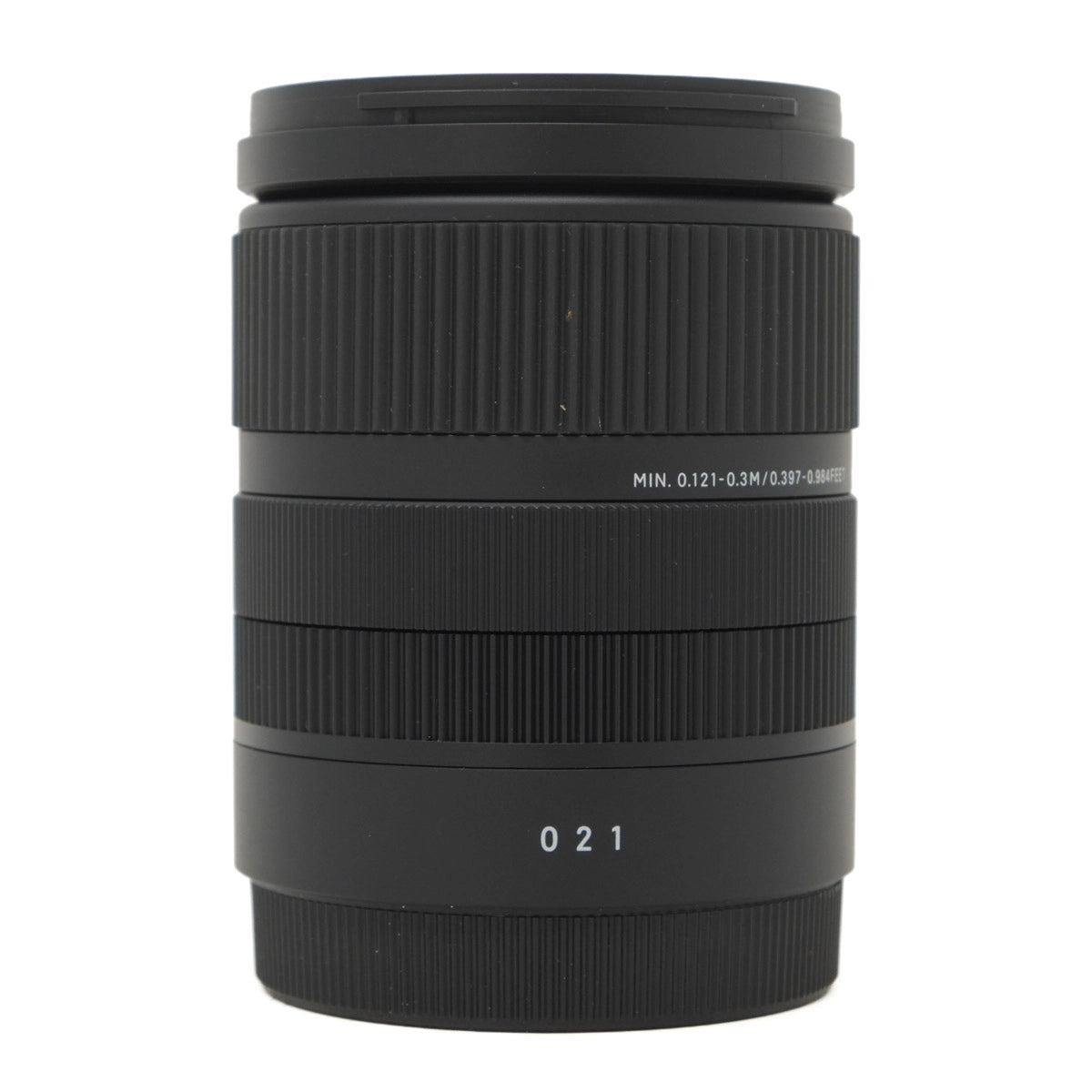 Black camera lens on a white background
