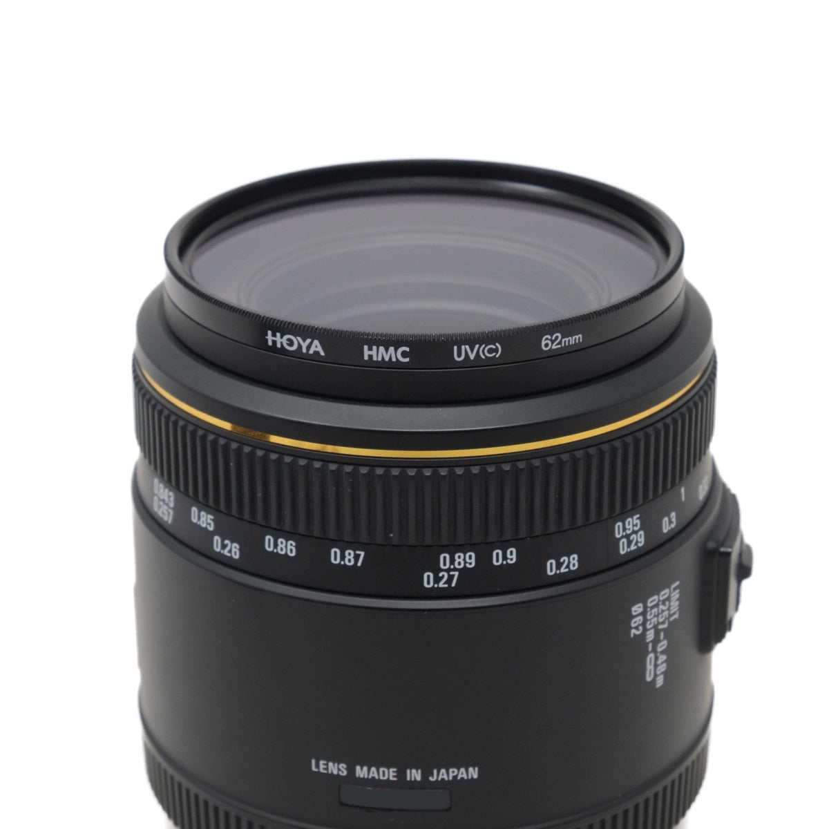 Camera lens with Hoya branding on a white background