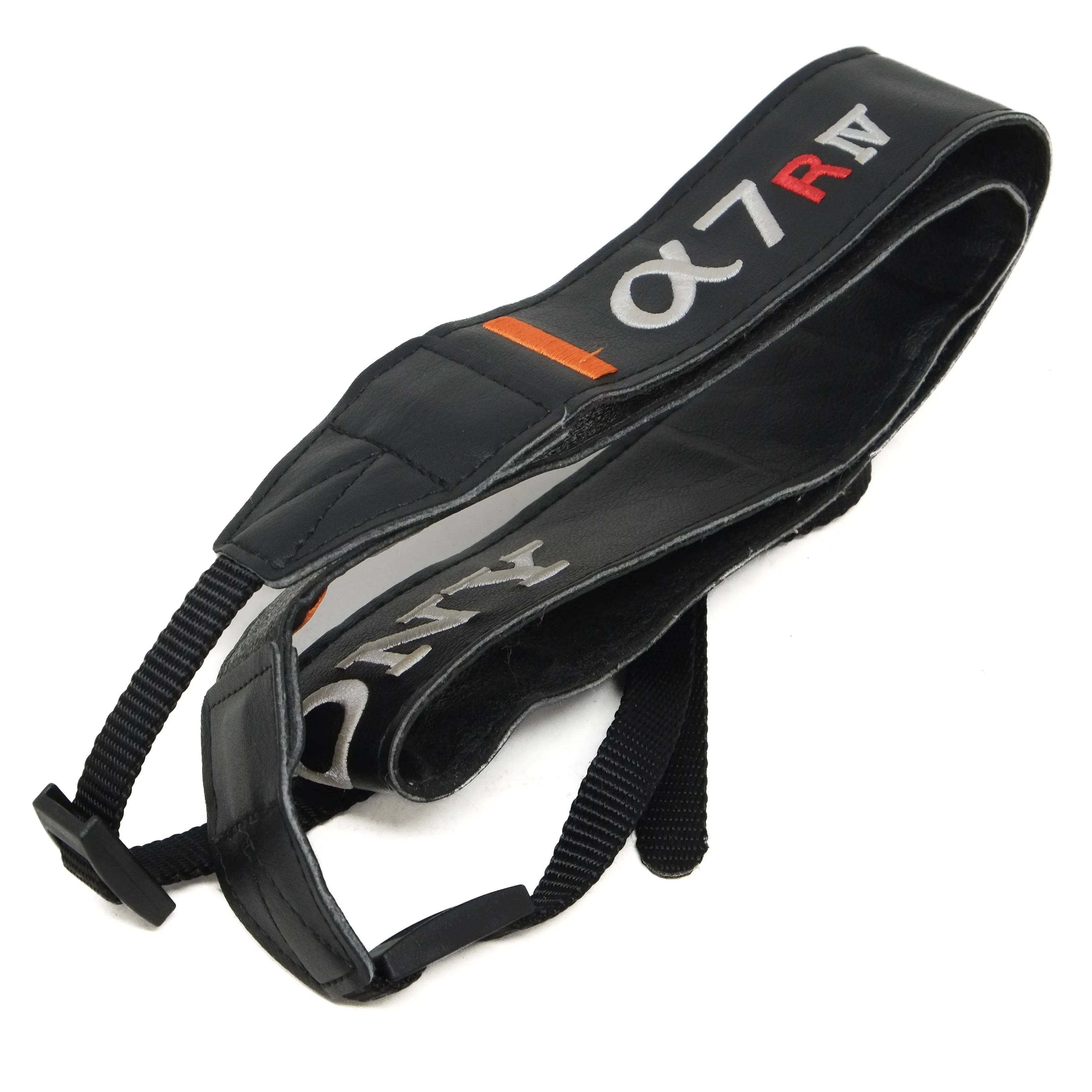 Black strap with 'alpha7R' branding on a white background