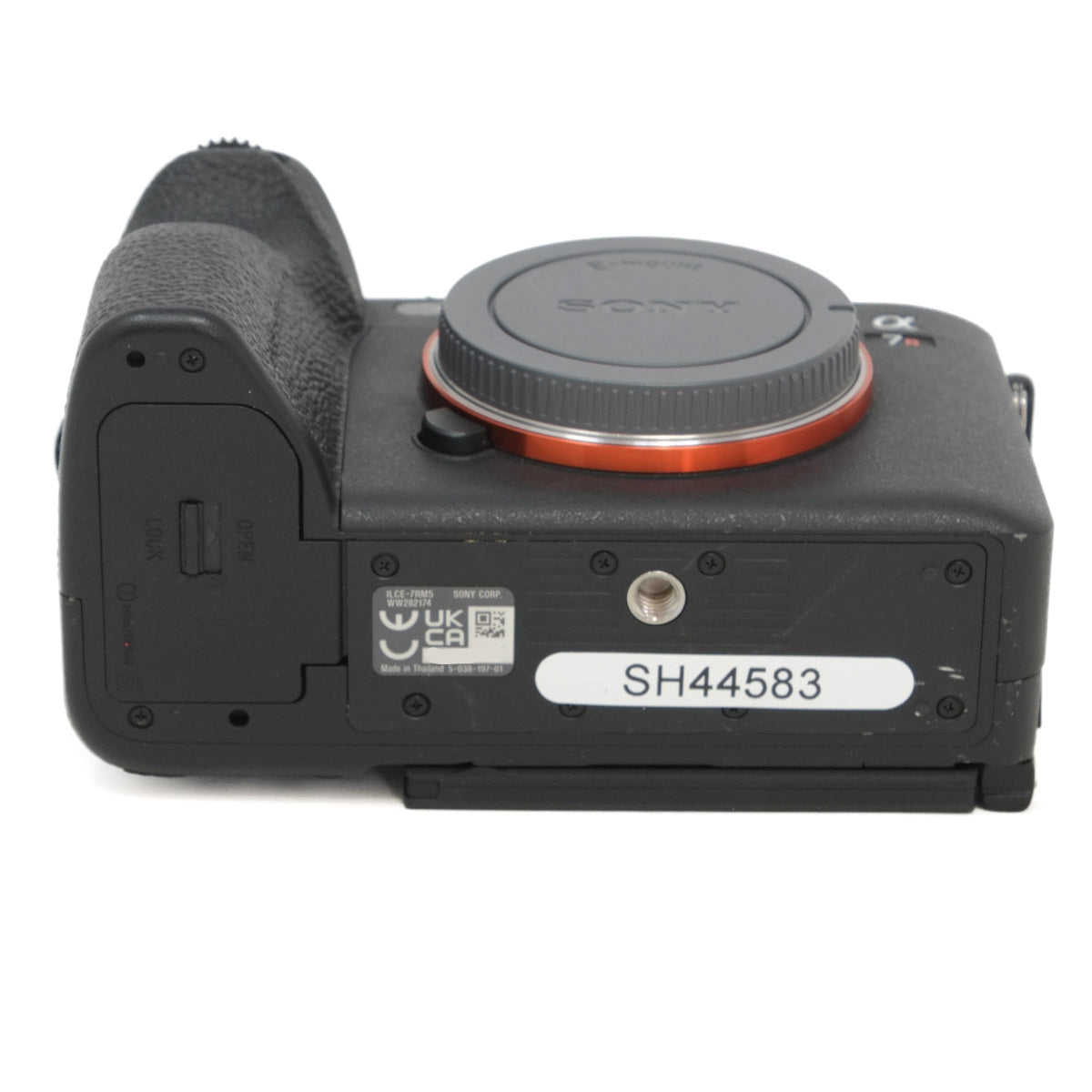 Bottom view of a Sony camera on a white background