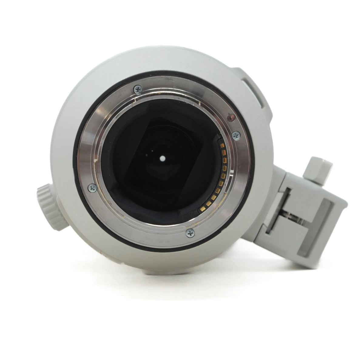 Camera lens with a white housing on a white background
