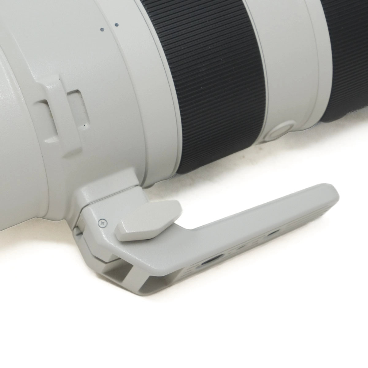 Close-up of a camera lens with a white background