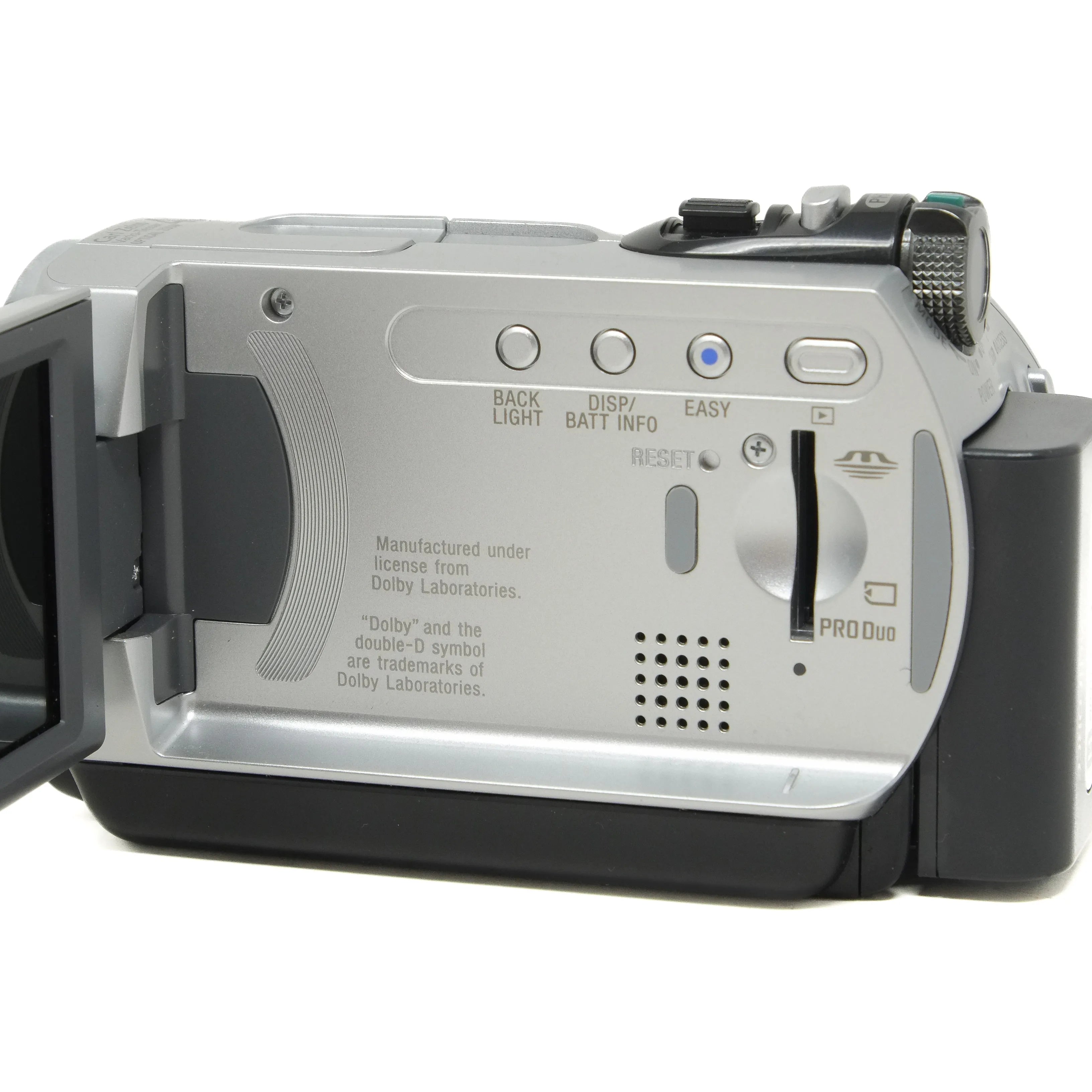 Close-up of a video camera's control panel on a white background