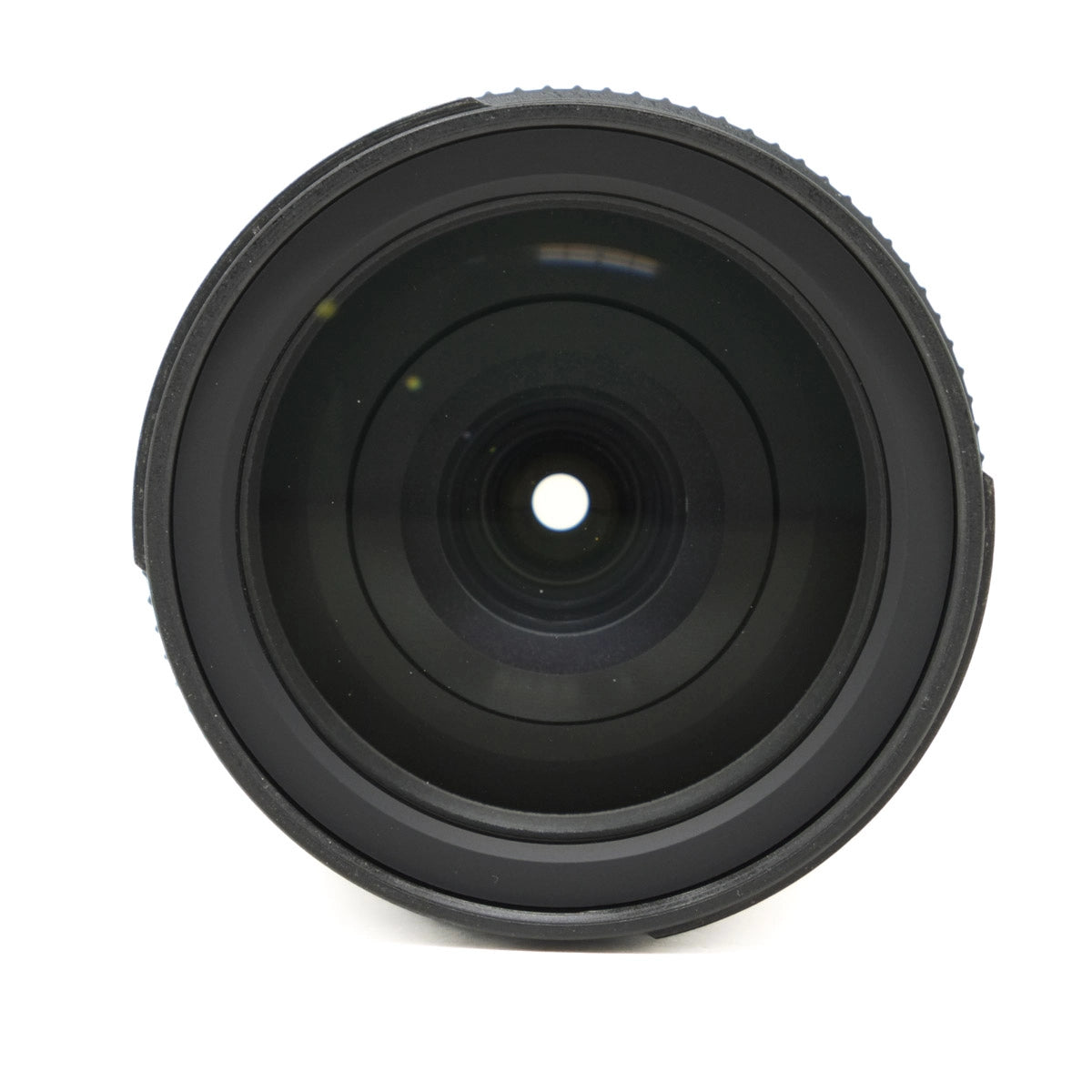 Black camera lens on a white background