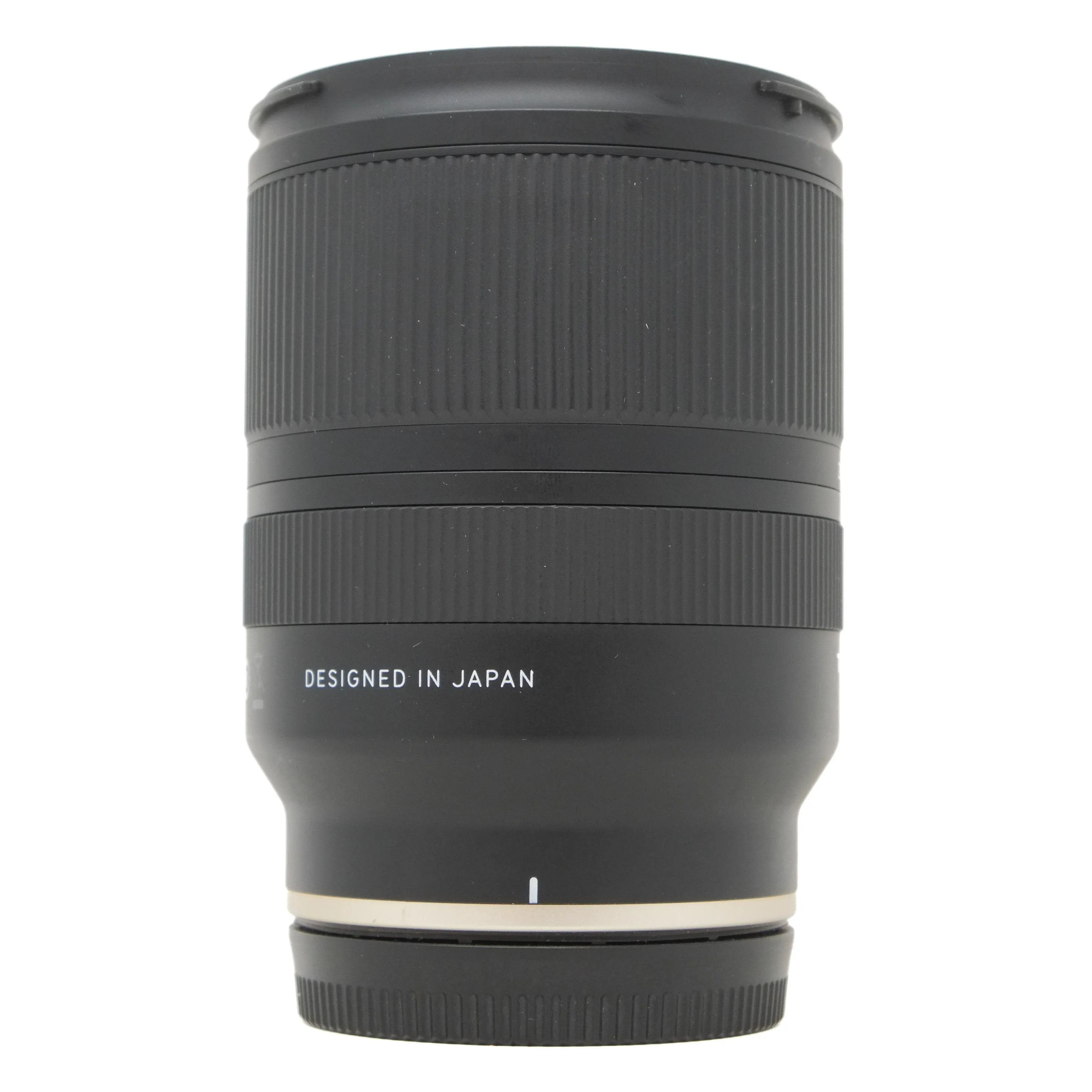 Camera lens with 'Designed in Japan' text on a white background