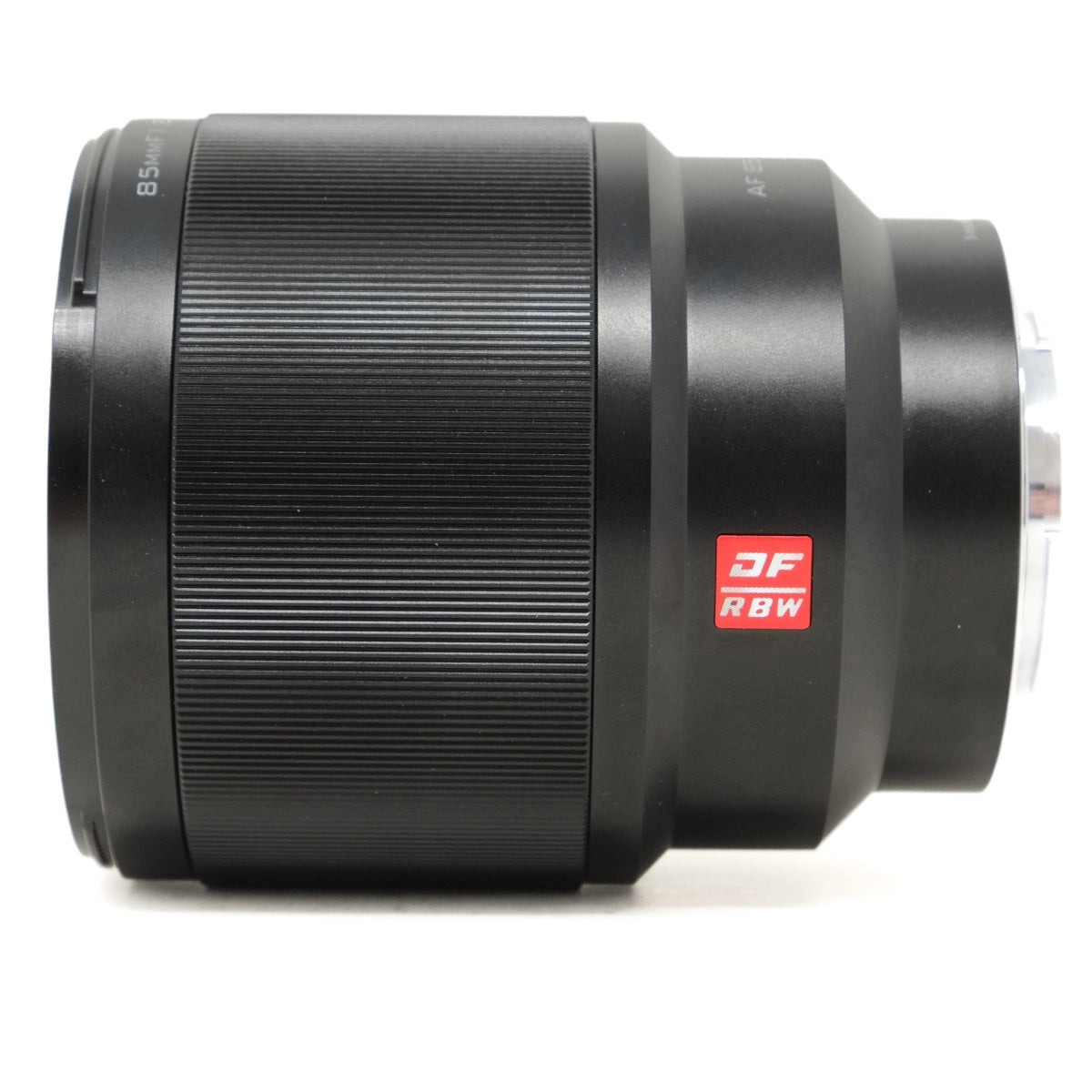 Black camera lens with a red and white logo on a white background