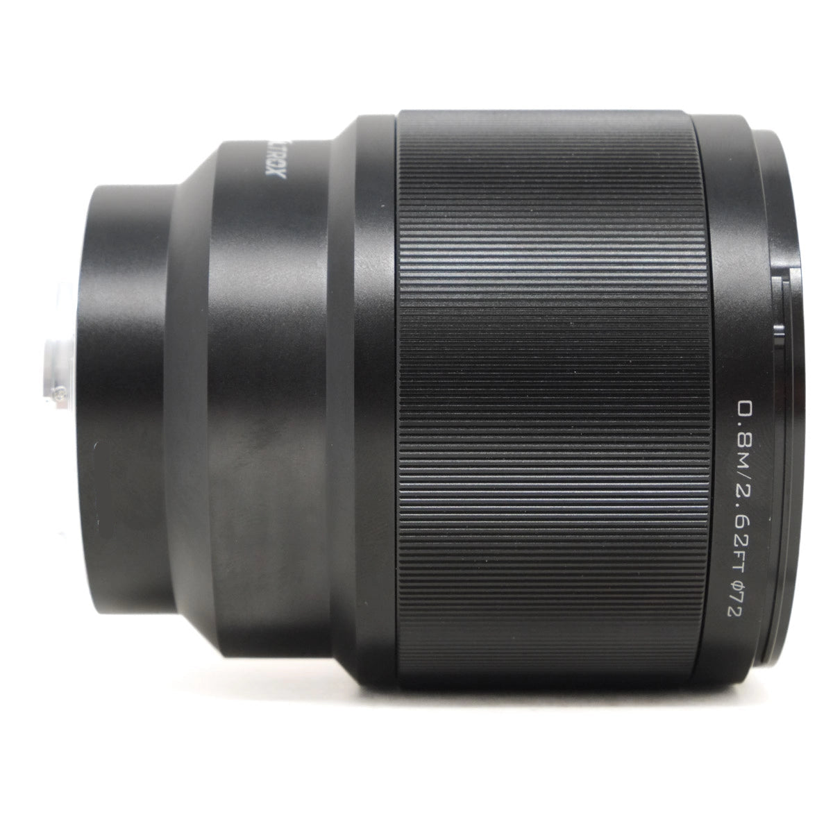 Black camera lens on a white background