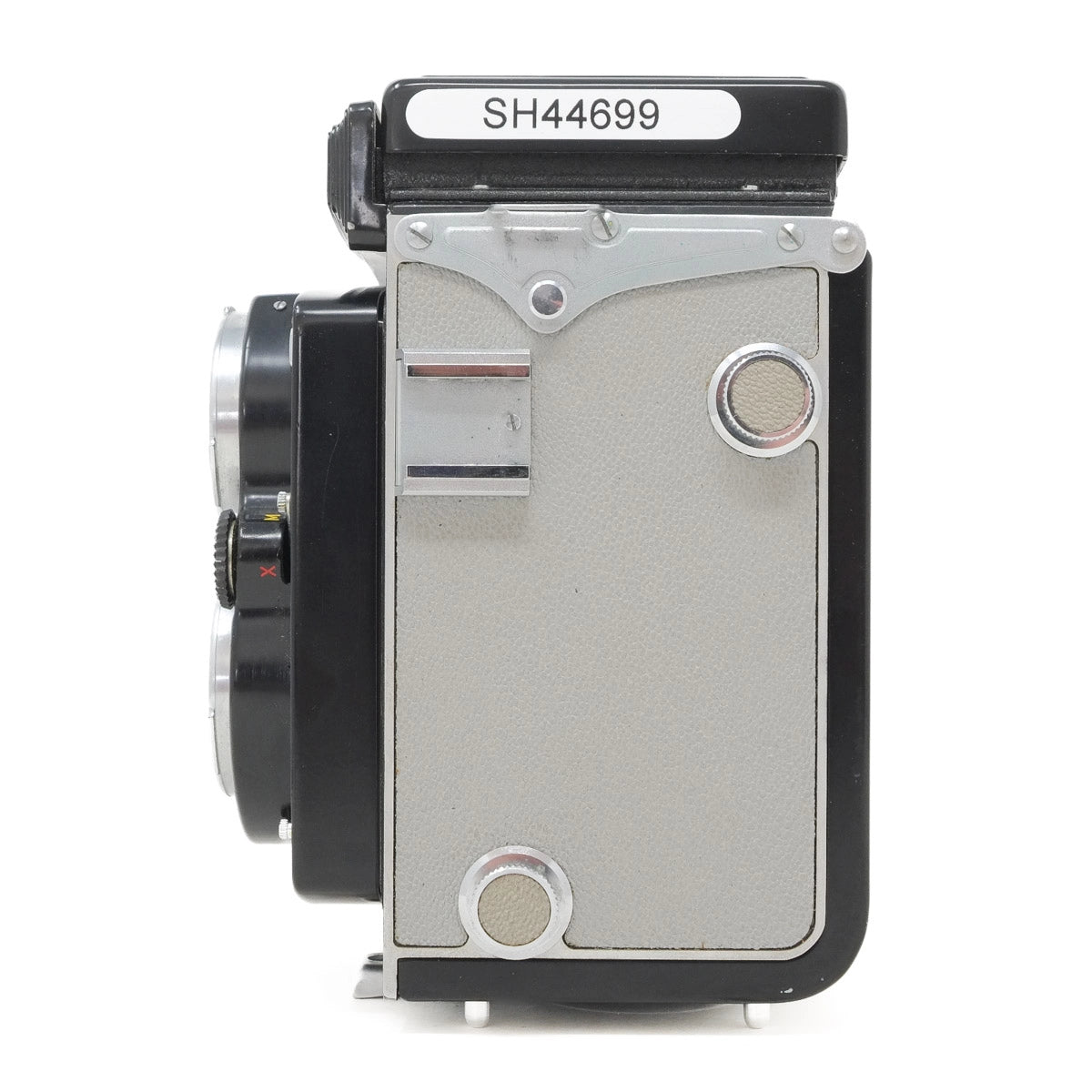 Vintage camera with a metallic finish on a white background