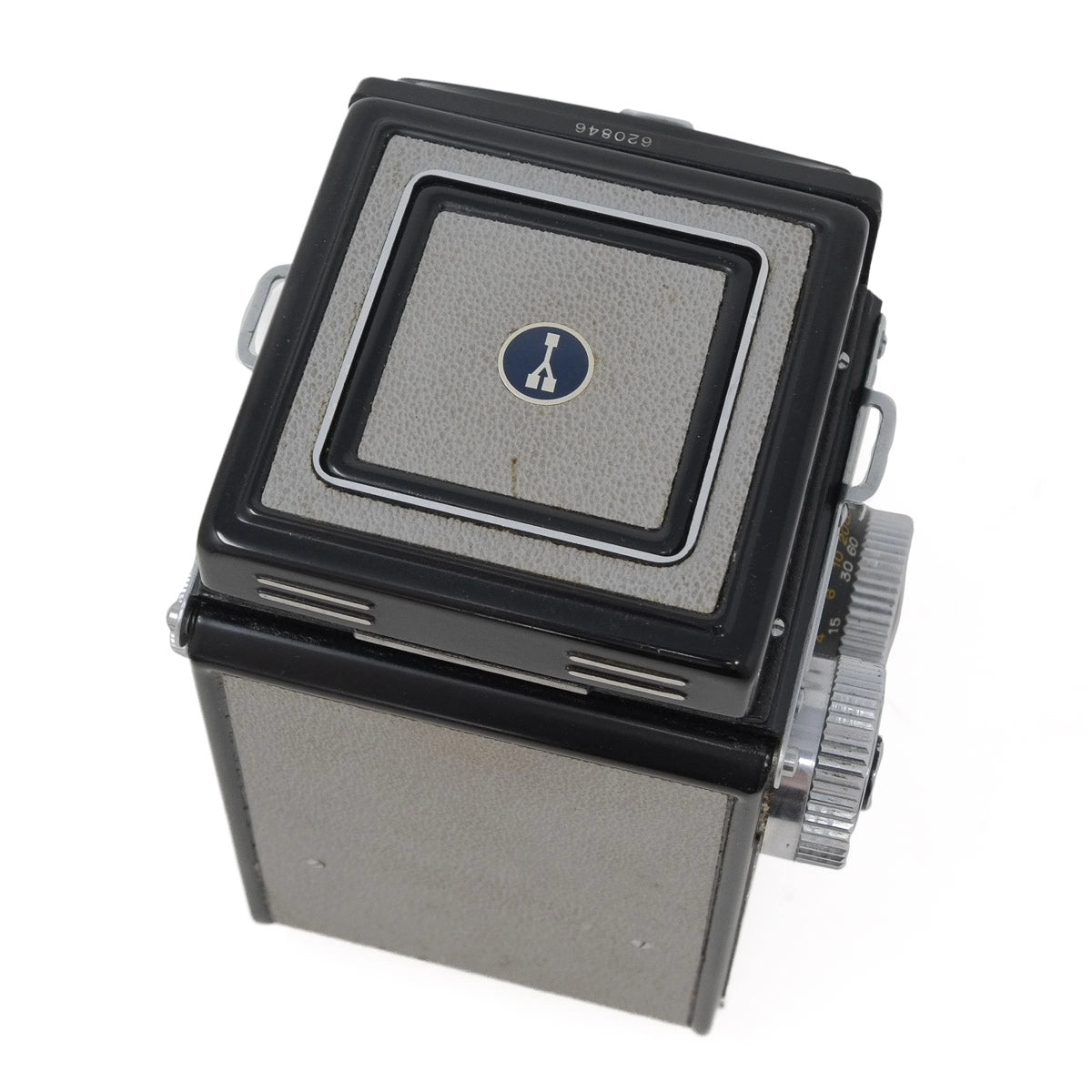 Vintage camera with a metallic finish on a white background