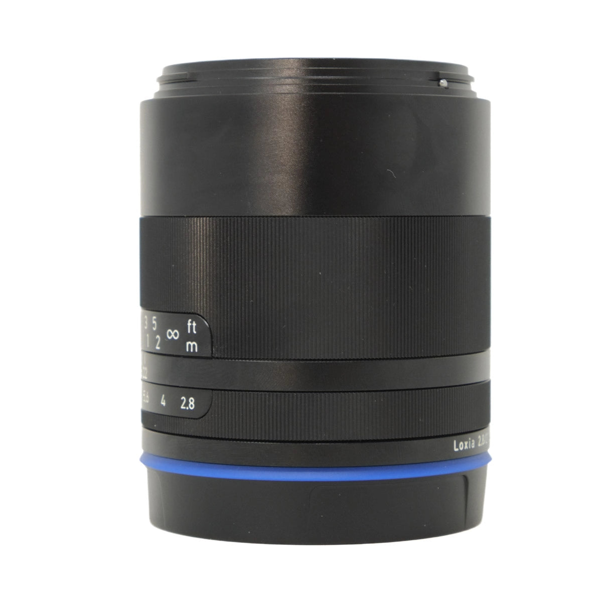 Black camera lens with focus scale on a white background