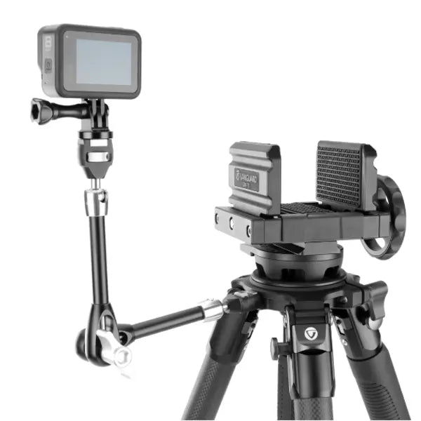 Camera on a tripod with a monitor attached, on a white background
