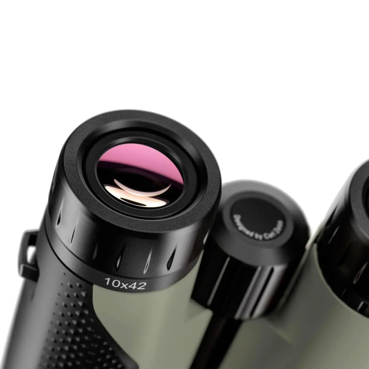 Close-up of a binoculars with a pink lens on a white background