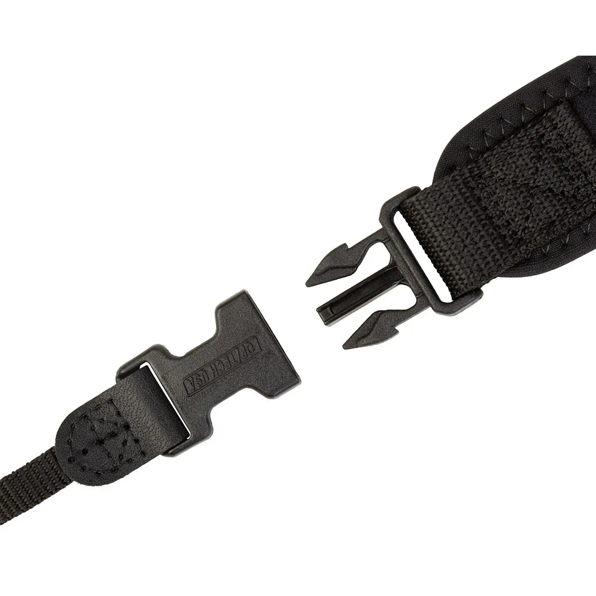 Close-up of a black tactical belt with a buckle on a white background